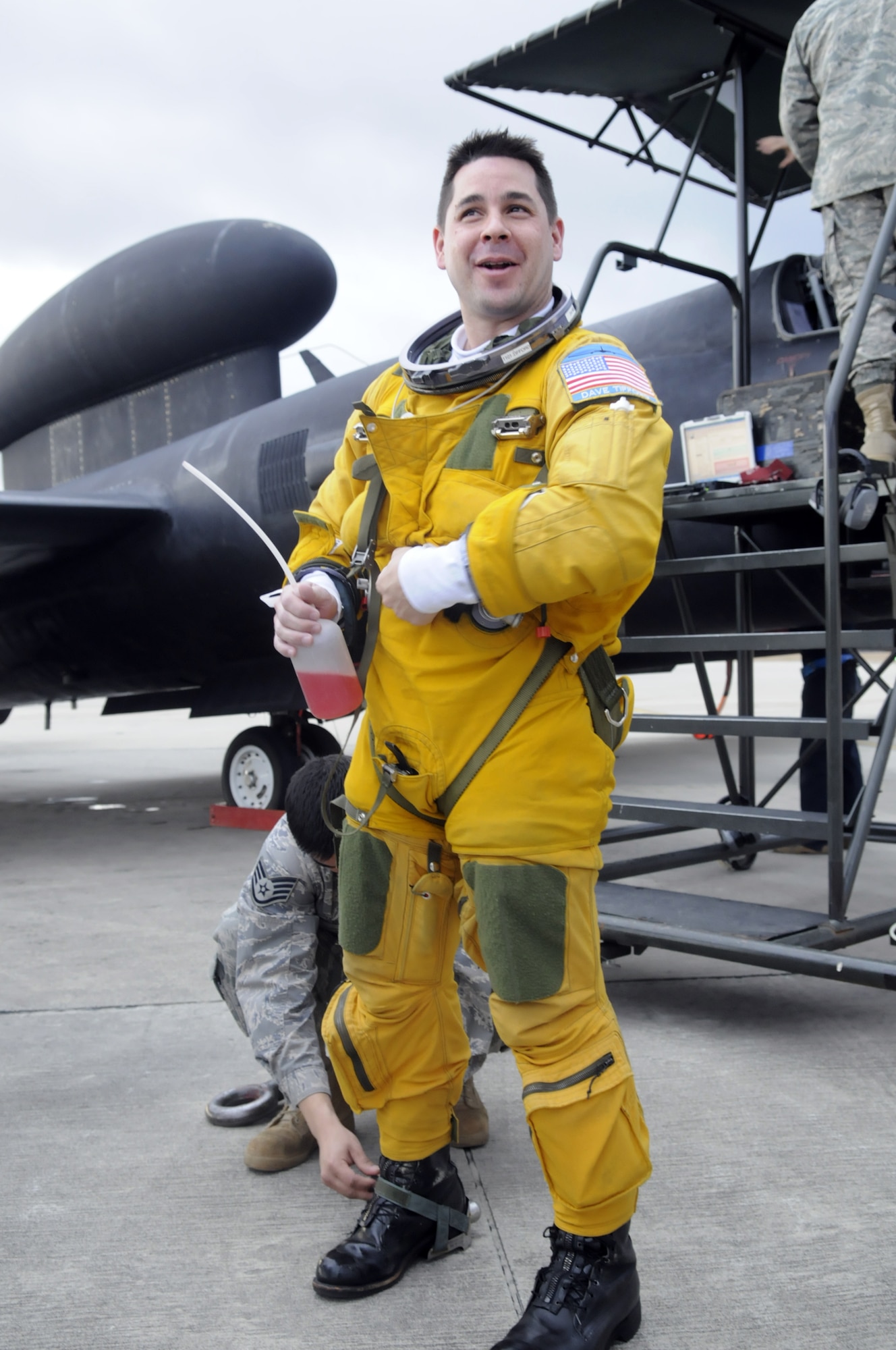 Major David Tifford, U-2 pilot, pauses for a breath of fresh air following the eight-hour flight over Haiti. U. S. Air Force photo by Sue Sapp