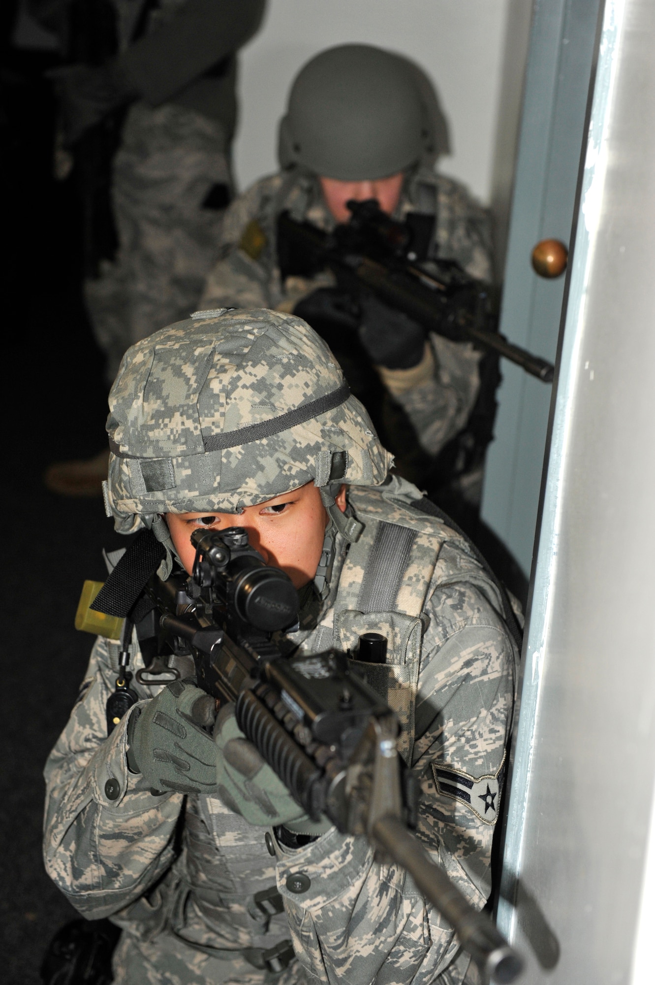 Airman 1st Class Tyler Wells, 19th Security Forces Squadron, provides frontal security Feb. 26 at Bldg. 272. 19 SFS Airmen established a perimeter and maintained its foothold before clearing Bldg. 272. (U.S. Air Force photo by Christine Clark)
