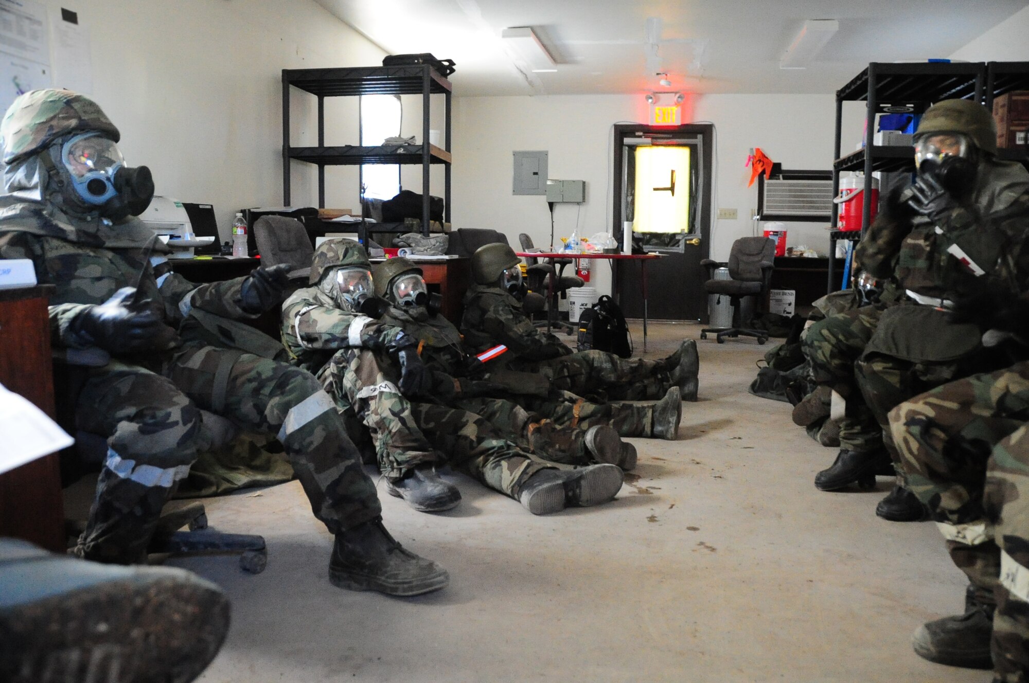 ELLSWORTH AIR FORCE BASE, S.D. -- Airmen from the 28th Medical Group bunker down in shelter during a Phase II Operational Readiness Exercise, March 2.  The Phase II ORE is designed to simulate a deployed environment and test the combat abilities of Ellsworth's Airmen. (U.S. Air Force photo/Airman 1st Class Anthony Sanchelli)
