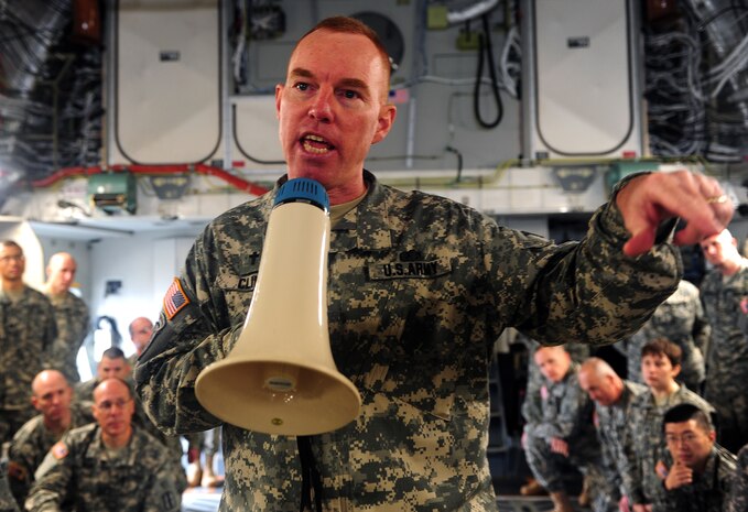 Army Chaplain (Maj.) Harold Cline instructs students on performing dignified transfers aboard a C-17 at Joint Base Charleston Feb. 23. The training event was part of a 12-week course taught at the U.S. Army Chaplain Center and School at Fort Jackson, S.C. Major Cline is a chaplain instructor for the USACHCS. (U.S. Air Force photo/Staff Sgt. Ali Flisek)
