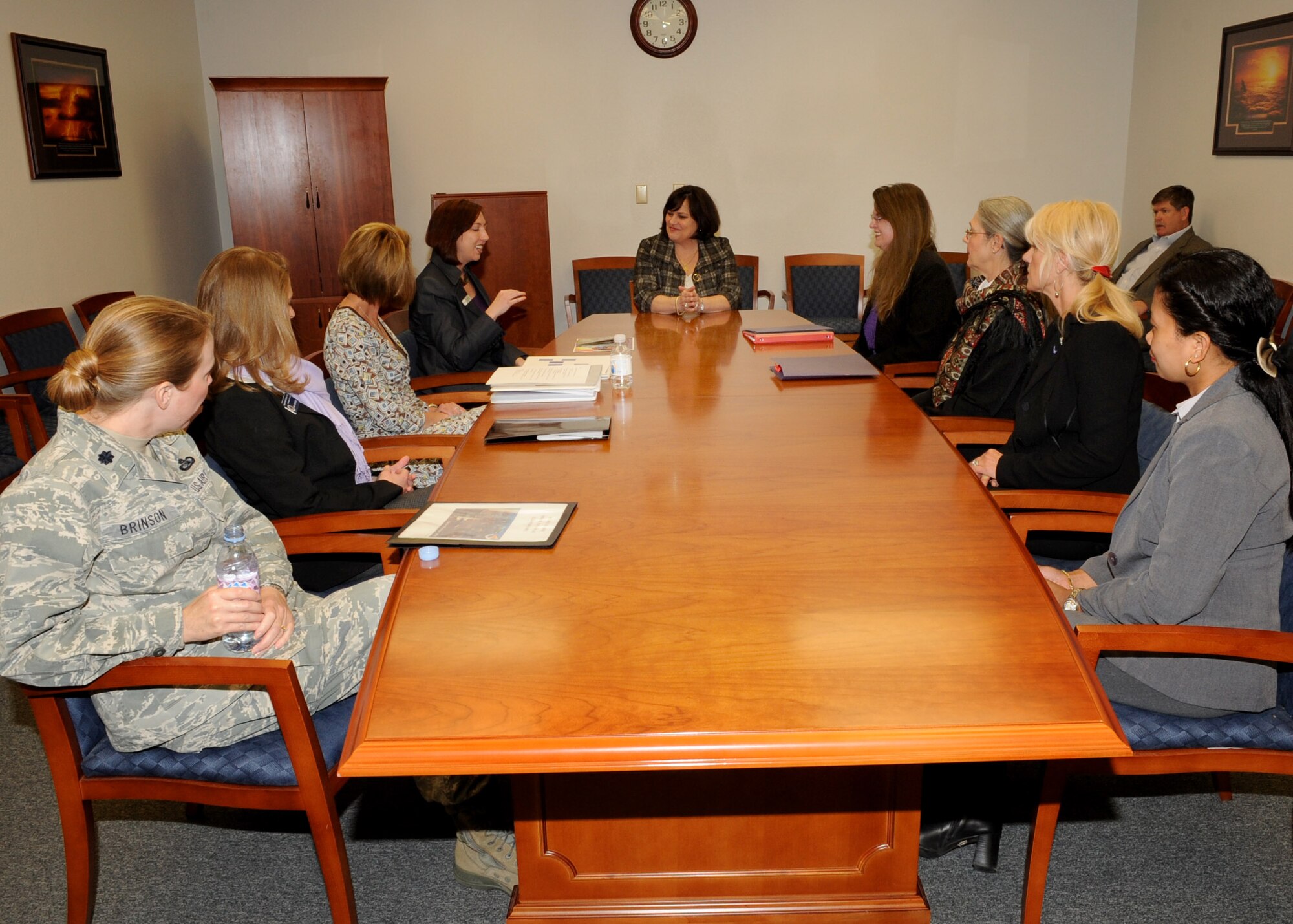 Staff members from the Airman and Family Readiness Center brief Bev Fraser, spouse of Air Combat Command Commander Gen. William M. Fraser III, on the services and programs available to Airmen at the Airman and Family Readiness Center here Feb. 23. As part of her tour, Mrs. Fraser visited different facilities on base to include the Sonoran Science Academy, the 355th Medical Group, and the Kennedy Professional Development Center. (U.S. Air Force photo/Airman Jerilyn Quintanilla)