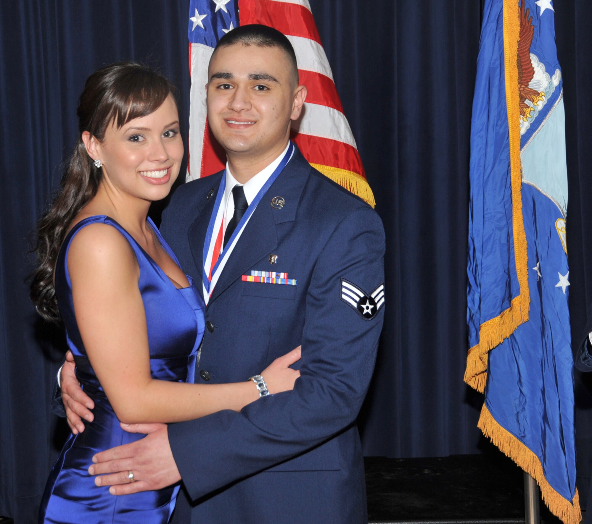 OFFUTT AIR FORCE BASE, Neb. - Senior Airman Rashad ElJurdi, with the 55th Medical Support Squadron, poses for a photograph with his wife Jasmin, at the 55th Wing Annual Awards Banquet at the Patriot Club here Feb. 26. Airman ElJurdi won Honor Guard Airman of the Year. U.S. Air Force photo by D.P. Heard