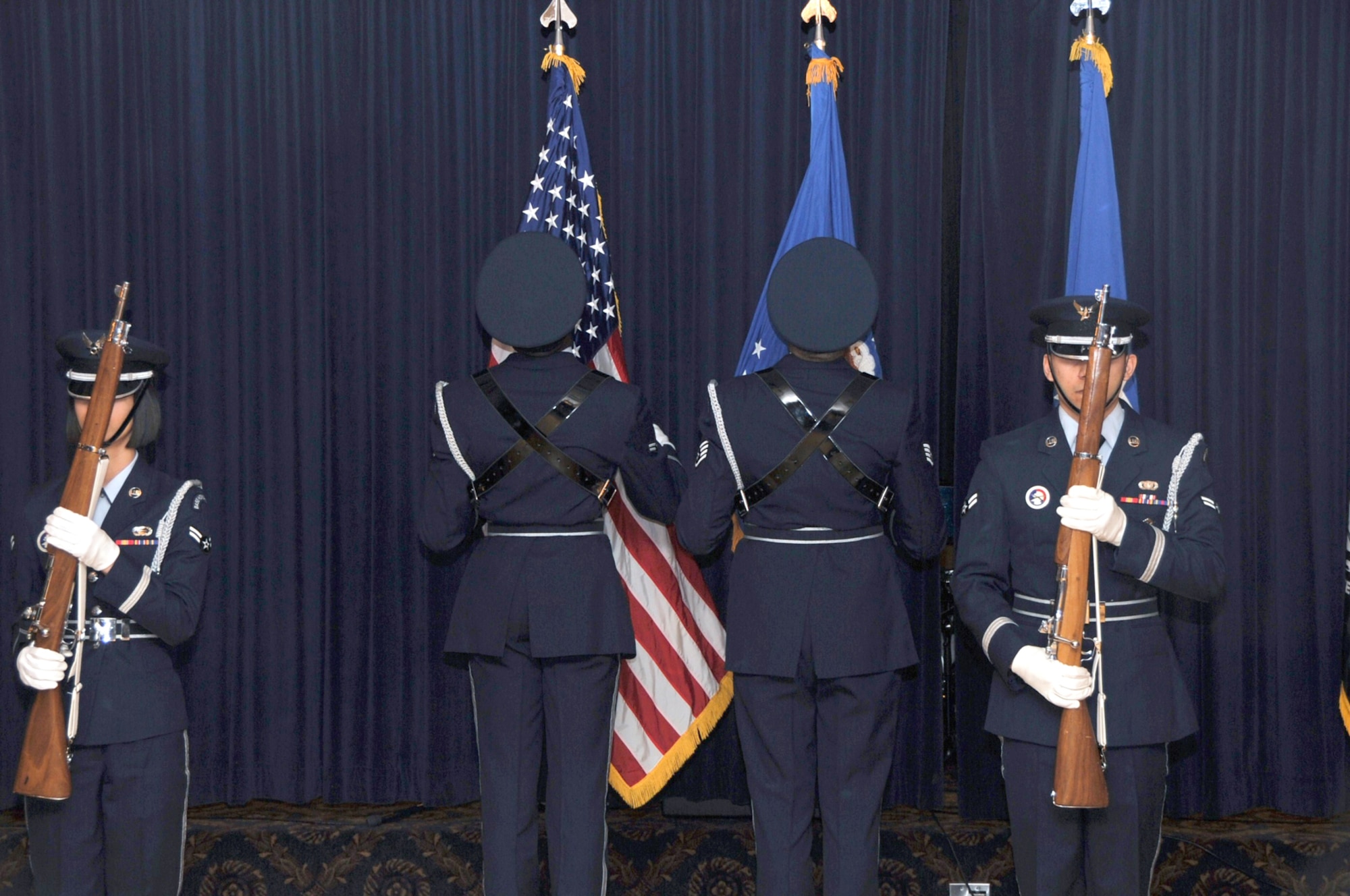 OFFUTT AIR FORCE BASE, Neb. - Members of the Offutt Honor Guard, post the colors at the start of the 55th Wing Annual Awards Banquet at the Patriot Club here Feb. 26. U.S. Air Force photo by D.P. Heard