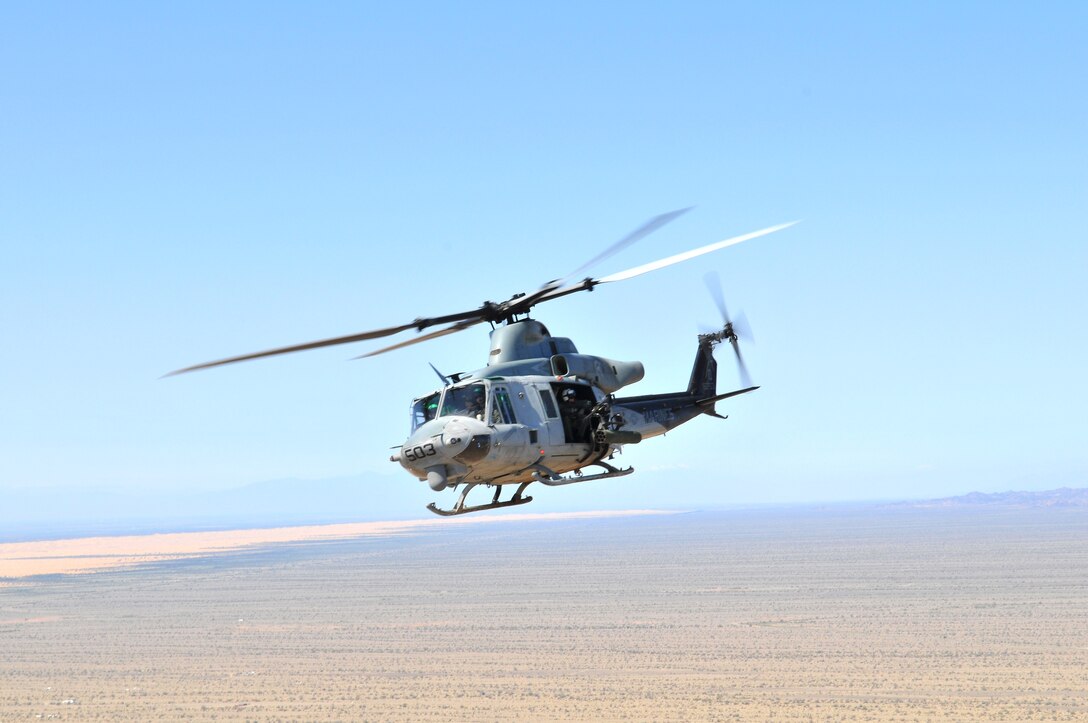 A UH-1Y Venom helicopter from Marine Light Attack Helicopter Training Squadron 303 flies over the Picacho State Recreation Area, Calif., March 3, 2010. The squadron was conducting familiarization flights to train new aviators in the operations of their aircraft and formation flying, before loading their weapons and attacking the Barry M. Goldwater Range’s Yodaville urban target complex for weapons training.