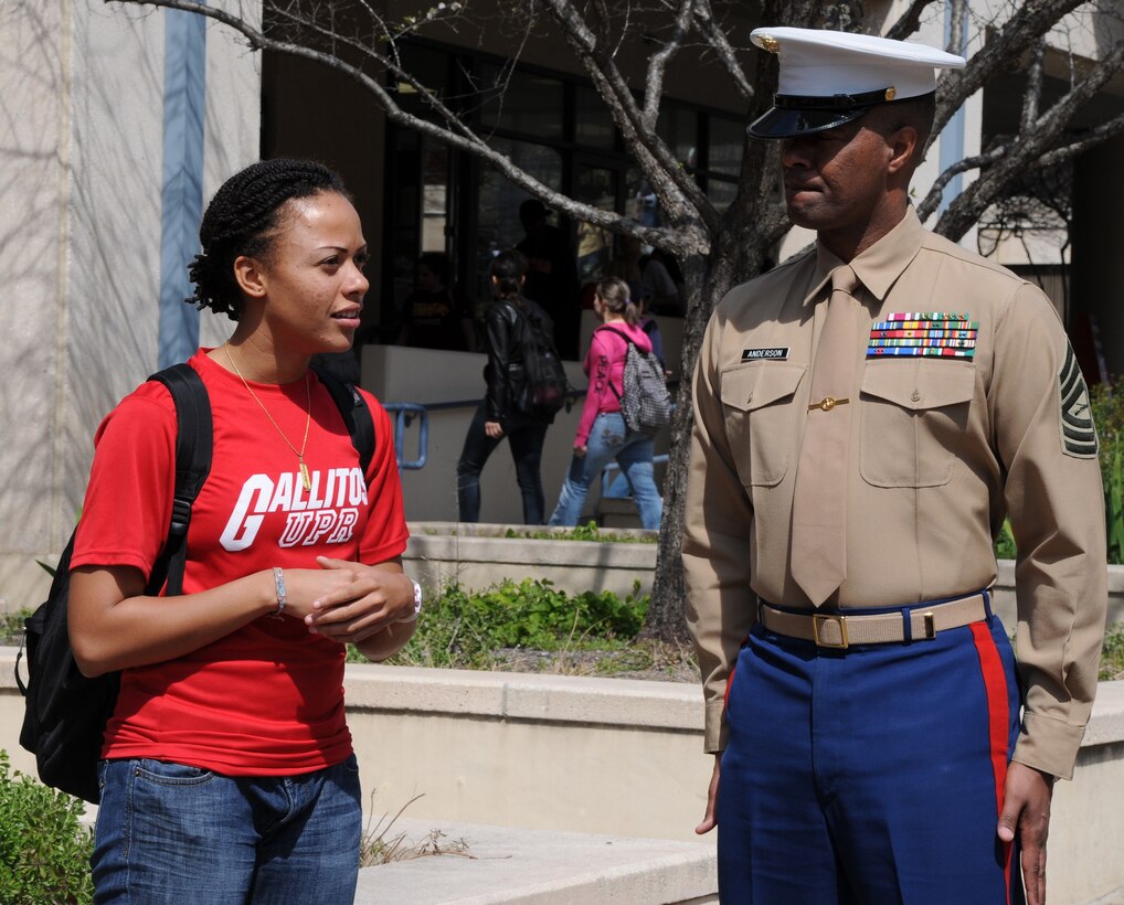 Master Sgt. Tony Anderson, a Recruiter Instructor trainer with Marine Corps Recruiting Command, talks to a student about an upcoming leadership workshop at the University of Texas at San Antonio.  As part of a push to diversify the Corps’ officer ranks, Marine officers from all walks of Corps life came together at the University of Texas at San Antonio to teach a group of more than 80 students the Marine Corps leadership traits and principles during a two-hour leadership workshop.  (Official Marine Corps photo by Staff Sgt. Matt Epright)