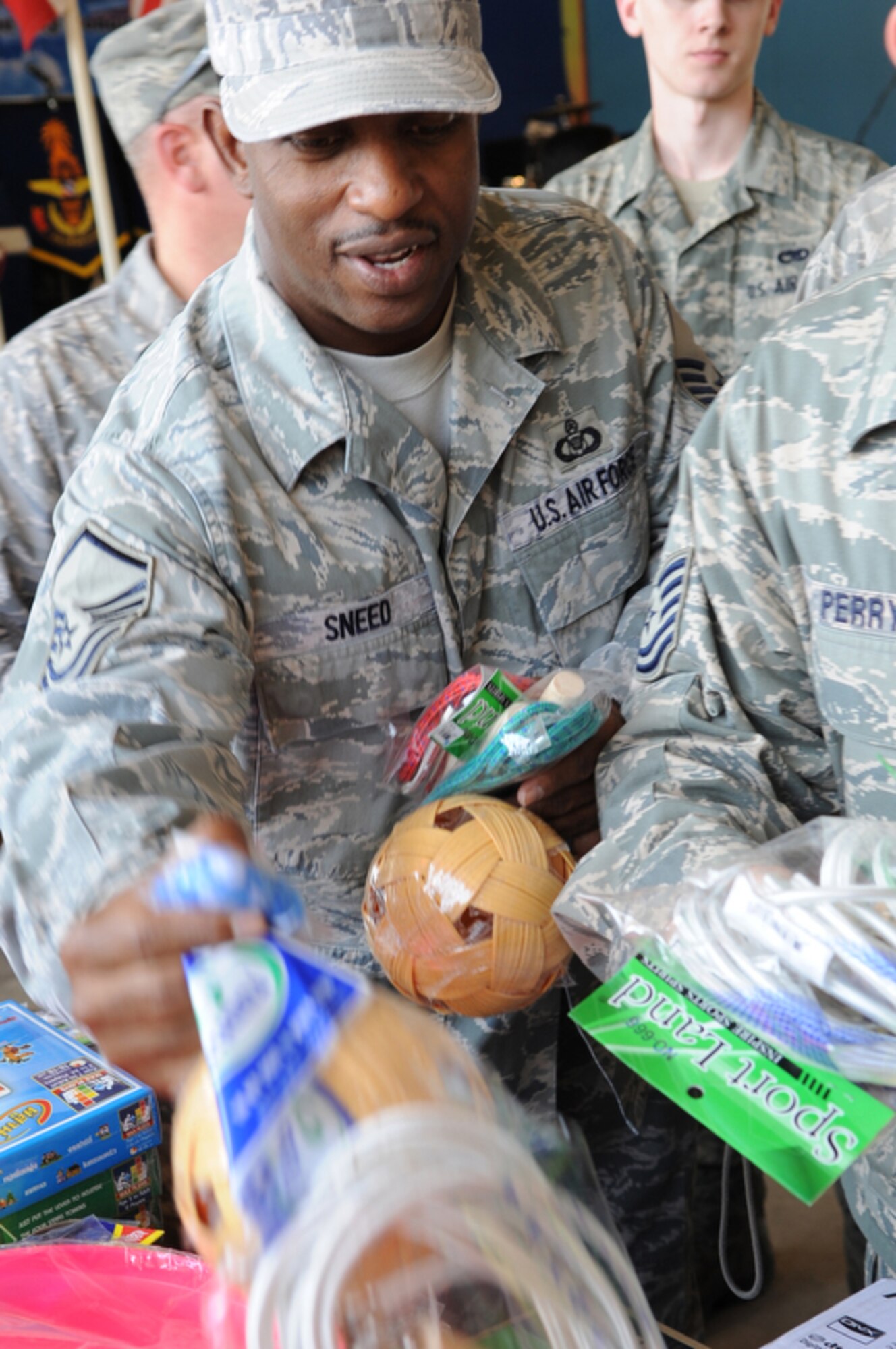 Master Sgt. Ray Sneed drops off toys for donation at Bau Nong Sroung School in Thailand during a Cope Tiger 2010 community relations event March 4.  Sergeant Sneed is deployed to the exercise from the 15th Operations Support Squadron at Joint Base Pearl Harbor Hickam, Hawaii.  Airmen from the U.S., Royal Thai and Republic of Singapore air forces teamed up to provide medical, dental and optometry care at the school to local residents as part of Cope Tiger 2010.  Money, school supplies, toys and games were also donated by all three air forces for the children at the school.  (U.S. Air Force photo/Tech Sgt. Cohen A. Young)