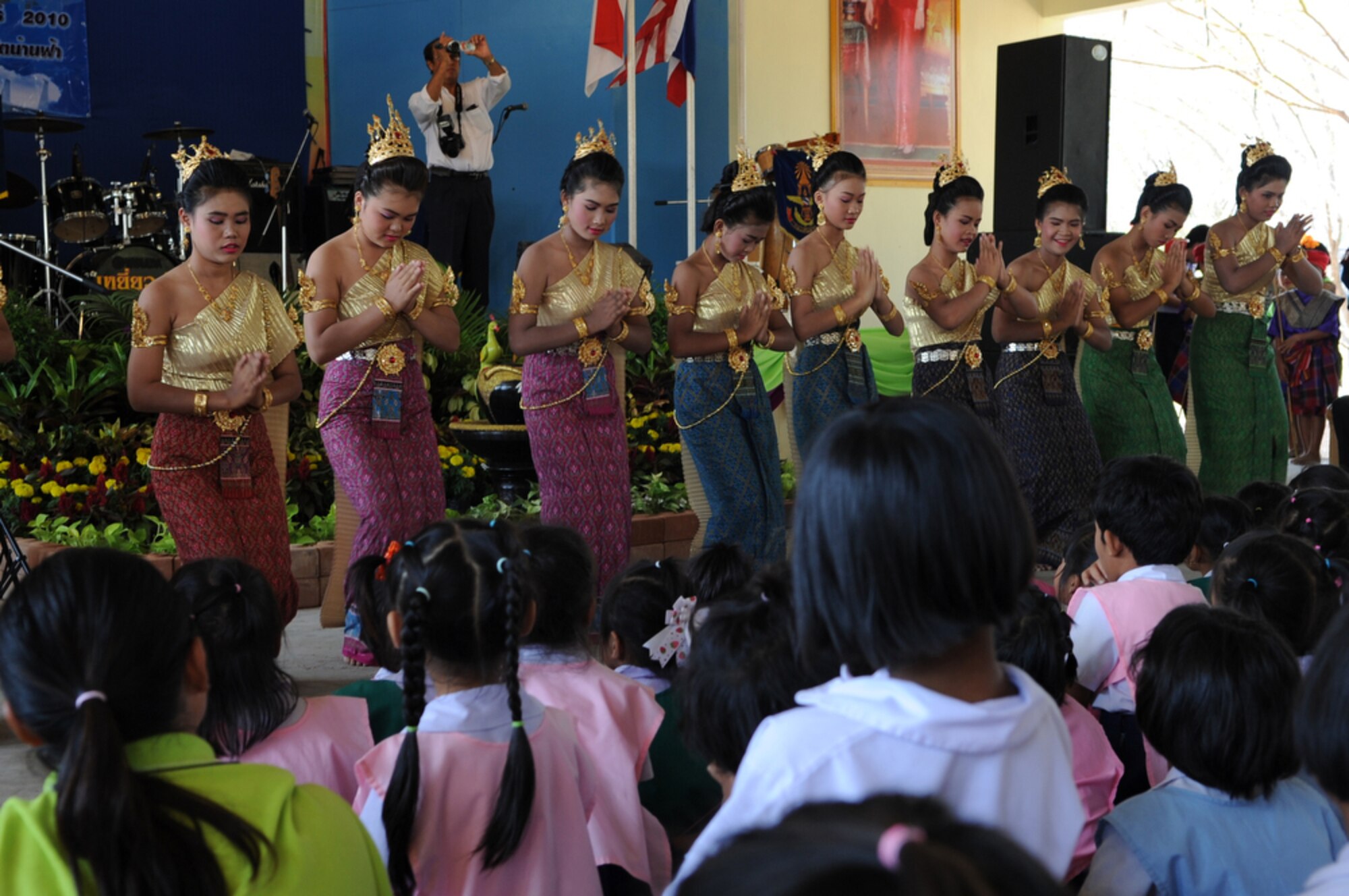 Performers at the Bau Nong Sroung School entertain onlookers during a Cope Tiger 2010 community relations event March 4.  Airmen from the U.S., Royal Thai and Republic of Singapore air forces teamed up to provide medical, dental and optometry care at the school to local residents as part of Cope Tiger 2010.  Money, school supplies, toys and games were also donated by all three air forces for the children at the school.  (U.S. Air Force photo/Tech Sgt. Cohen A. Young)