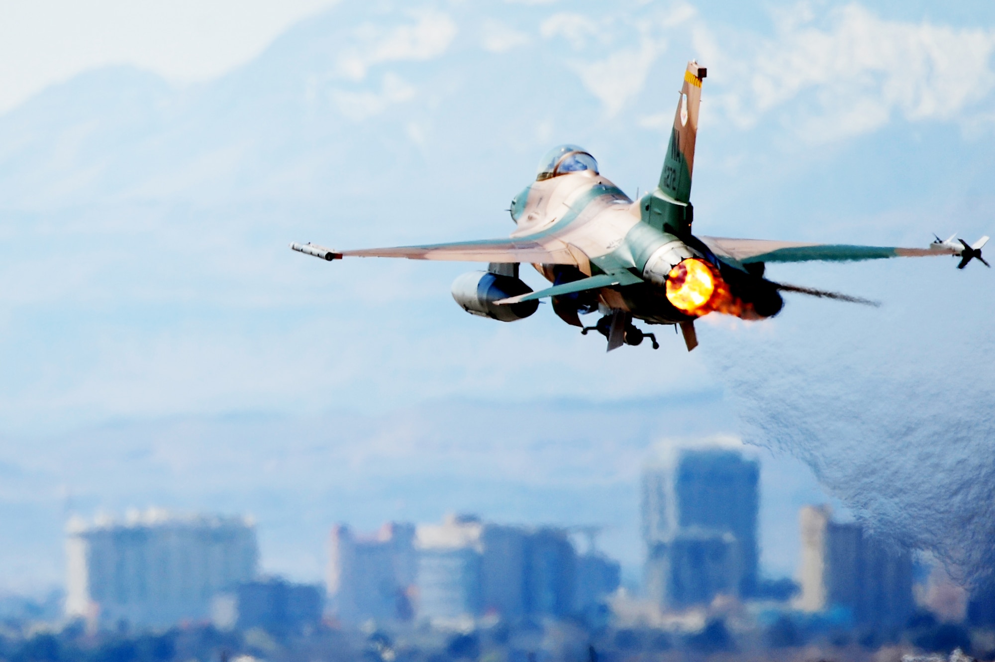 An F-16 Aggressor takes off March 3, 2010, during a Red Flag Exercise at Nellis Air Force Base, Nev. Red Flag is a realistic combat training exercise involving the air forces of the United States and its allies. The exercise is conducted on the 15,000-square-mile Nevada Test and Training Range, north of Las Vegas. (U.S. Air Force Photo/Staff Sgt. William P. Coleman)

