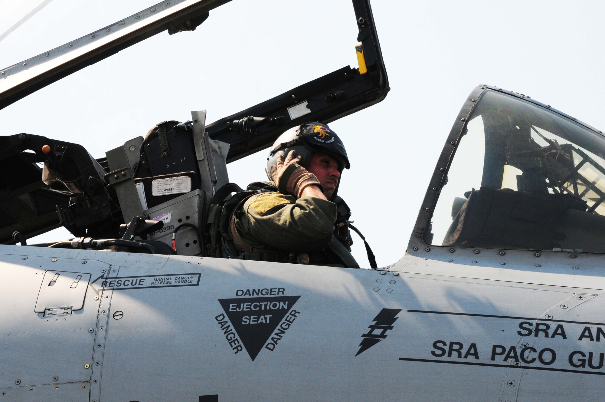 Capt. Matthew Lackey secures his helmet prior to flying the first A-10 Thunderbolt II mission of Cope Tiger 2010 at Udon Thani Royal Thai Air Force Base, Thailand, on March 4. Captain Lackey is deployed to the exercise from the 25th Fighter Squadron at Osan Air Base, South Korea.  His squadron is participating in the annual, multilateral field training exercise involving the U.S. Air Force, Royal Thai Air Force and Army, and the Republic of Singapore Air Force March 1-12.  (U.S. Air Force photo/Capt. Genieve David)