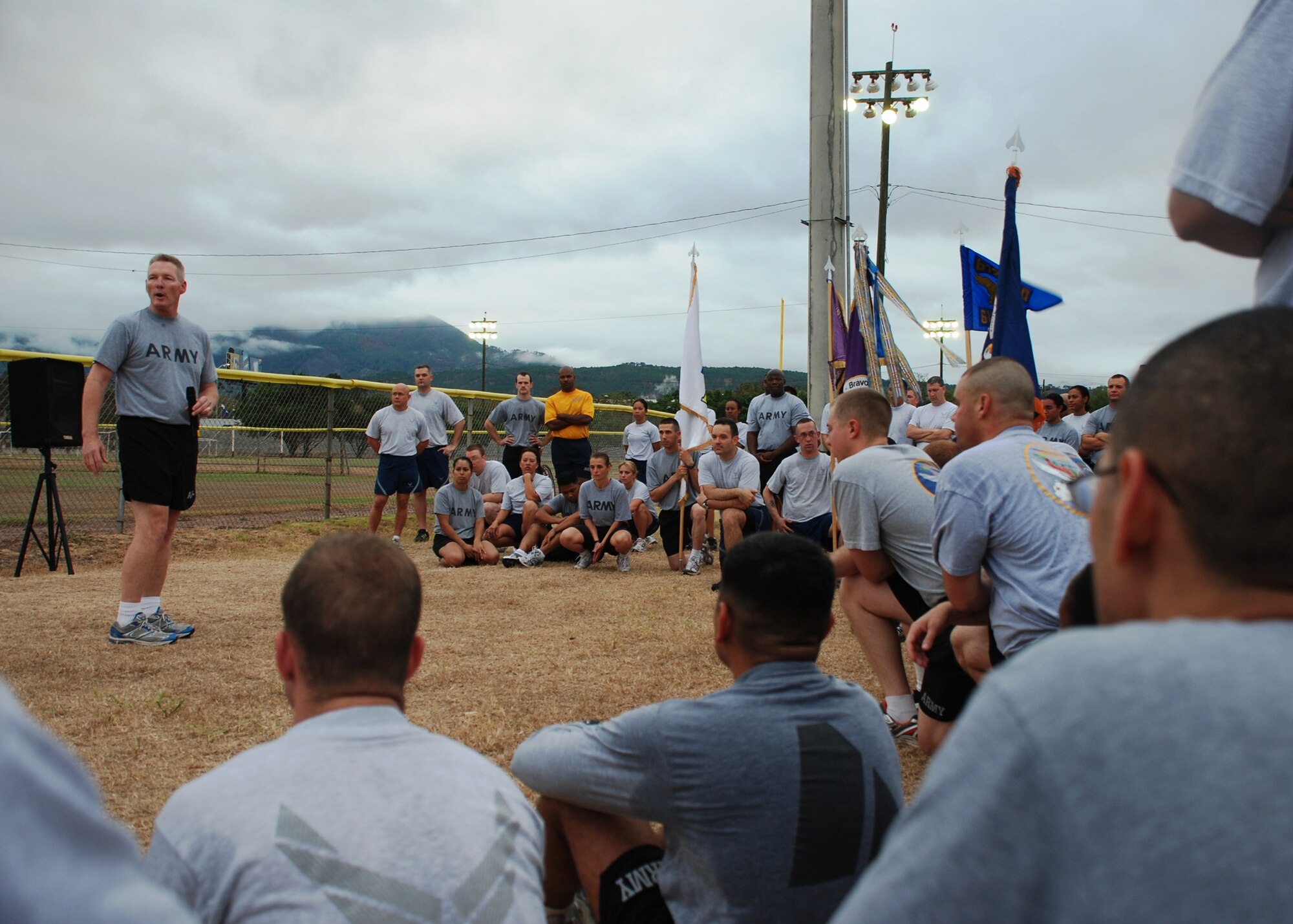 Army Col. Gregory Reilly, Joint Task Force-Bravo commander, speaks to Soldiers, Sailors, Airmen and Marine following a morning formation run around Soto Cano Air Base, Honduras, March 4. All of Team Soto Cano was represented in the formation run, designed to build unit cohesion and esprit de corps. (U.S. Air Force photo by 1st Lt. Jennifer Richard)


