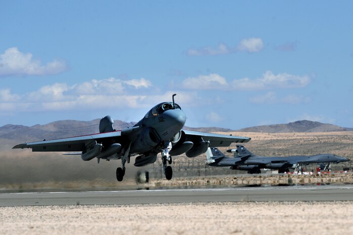 NELLIS AIR FORCE BASE, Nev. -- An EA-6B Prowler from the Tactical Electronic Warfare Squadron One Three Nine, (VAQ-139) Whidbey Island, Wash. take off from the Nellis flightline during Red Flag 10-3, March 3, 2010. Red Flag is a realistic combat training exercise involving the air forces of the United States and its allies. The exercise is conducted on the 15,000-square-mile Nevada Test and Training Range, north of Las Vegas. Red Flag 10-3 March  3, 2010.   (U.S. Air Force photo by Tech. Sgt. Michael R. Holzworth/RELEASED)