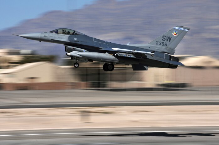 NELLIS AIR FORCE BASE, Nev. --  A 55th Fighter Squadron F-16, from Shaw AFB, S.C. takes off from the Nellis flightline for a training mission during Red Flag 10-3 March 3, 2010. Red Flag is a realistic combat training exercise involving the air forces of the United States and its allies. The exercise is conducted on the 15,000-square-mile Nevada Test and Training Range, north of Las Vegas. (U.S. Air Force photo by Tech. Sgt. Michael R. Holzworth/RELEASED)