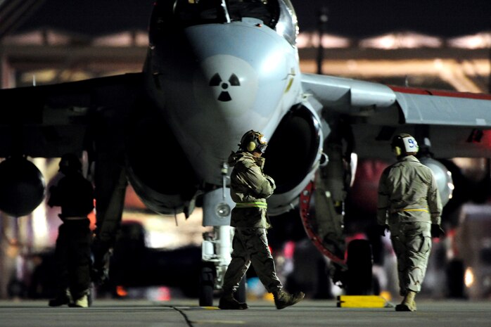 NELLIS AIR FORCE BASE, Nev. -- Sailors from the Tactical Electronic Warfare Squadron Two Zero Nine (VAQ-209) from Andrews Air Force Base, M.D. prepare an EA-6B Prowler for flight at Red Flag 10-3 Mar. 2, 2010.  Red Flag is a realistic combat training exercise involving the air forces of the United States and its allies. The exercise is conducted on the 15,000-square-mile Nevada Test and Training Range, north of Las Vegas.  (U.S. Air Force Photo by Staff Sgt. William P. Coleman/RELEASED)