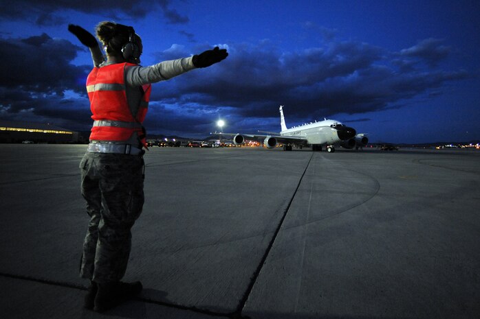 NELLIS AIR FORCE BASE, Nev. -- Senior Airman Amy Jo Kielisch from the 55th Aircraft Maintenance Squadron, Offutt AFB, Neb. launches a RC-135V/W Rivet Joint reconnaissance aircraft, from the Nellis AFB flight line during Red Flag 10-3 March 2, 2010.  Red Flag is a realistic combat training exercise involving the air forces of the United States and its allies. The exercise is conducted on the 15,000-square-mile Nevada Test and Training Range, north of Las Vegas. (U.S. Air Force photo by Tech. Sgt. Michael R. Holzworth/RELEASED)
