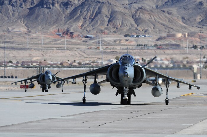 NELLIS AIR FORCE BASE, Nev -- Two  1st Fighter Squadron, Royal Air Force Cottesmore, United Kingdom, GR-9 Harrier taxi toward the end of the runway for  from the Nellis flightline during Red Flag 10-3 Feb 25, 2010. Red Flag is a realistic combat training exercise involving the air forces of the United States and its allies. The exercise is conducted on the 15,000-square-mile Nevada Test and Training Range, north of Las Vegas.   (U.S. Air Force photo by Tech. Sgt. Michael R. Holzworth/RELEASED)