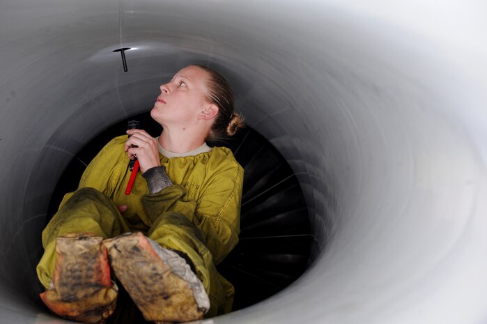 NELLIS AIR FORCE BASE, Nev. -- Staff Sgt. Tilly Baity, a crew chief assigned to the 20th Aircraft Maintenance Squadron, Shaw AFB S.C. conducts an inspection of a 55th Fighter Squadron F-16 Intake during Red Flag 10-3 Feb 25, 2010.  Red Flag is a realistic combat training exercise involving the air forces of the United States and its allies. The exercise is conducted on the 15,000-square-mile Nevada Test and Training Range, north of Las Vegas.  (U.S. Air Force photo by Tech. Sgt. Michael R. Holzworth/RELEASED)