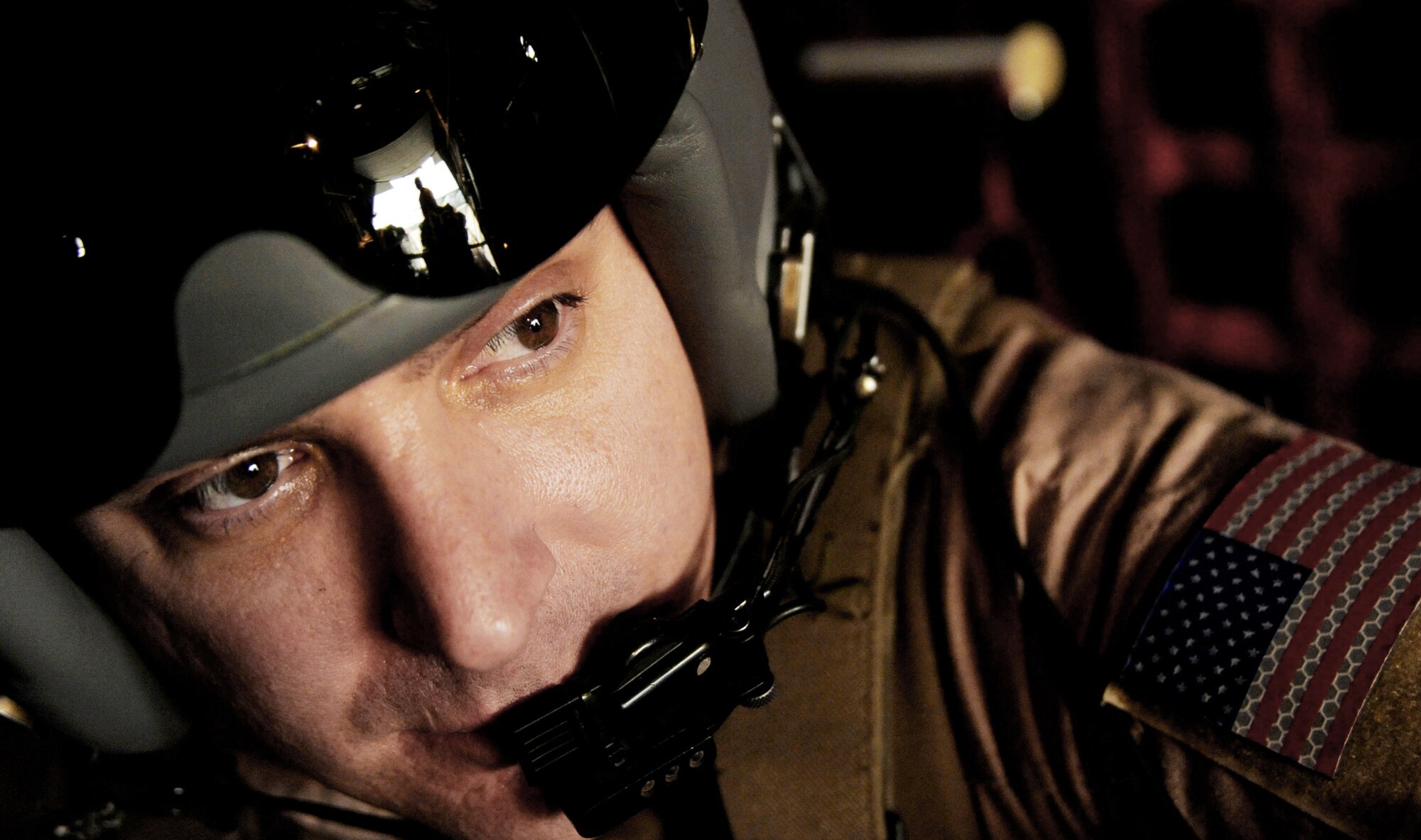 Tech. Sgt. Brian Miliefsky watches as other loadmasters prepare for take-off on a C-130 Hercules Feb. 6, 2010, in Afghanistan. Sergeant Miliefsky is a loadmaster with the 774th Expeditionary Airlift Squadron at Bagram Airfield, Afghanistan. (U.S. Air Force photo/Staff Sgt. Angelita Lawrence)