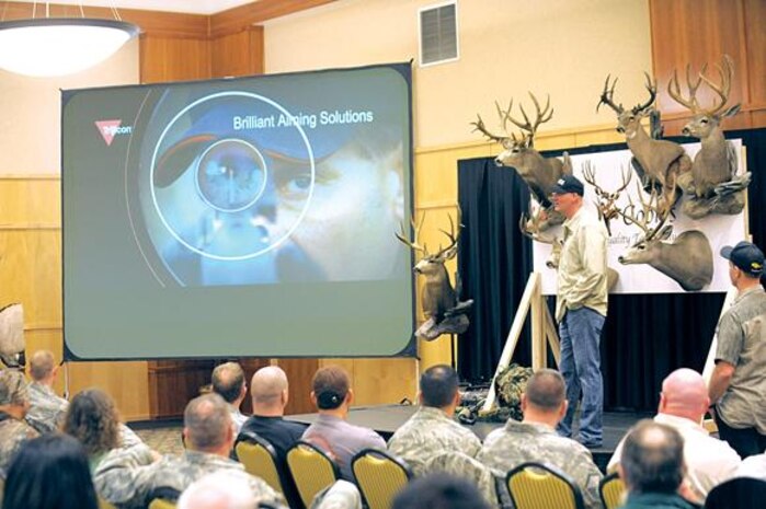 Jim Burnworth of the cable show, "Western Extreme," talks and takes questions at the Western Extreme symposium held at Club Hill on Feb. 25. The Outdoor Channel show host was visiting Hill Air Force Base to film interviews with Airmen and others for broadcast on his show later this year.
