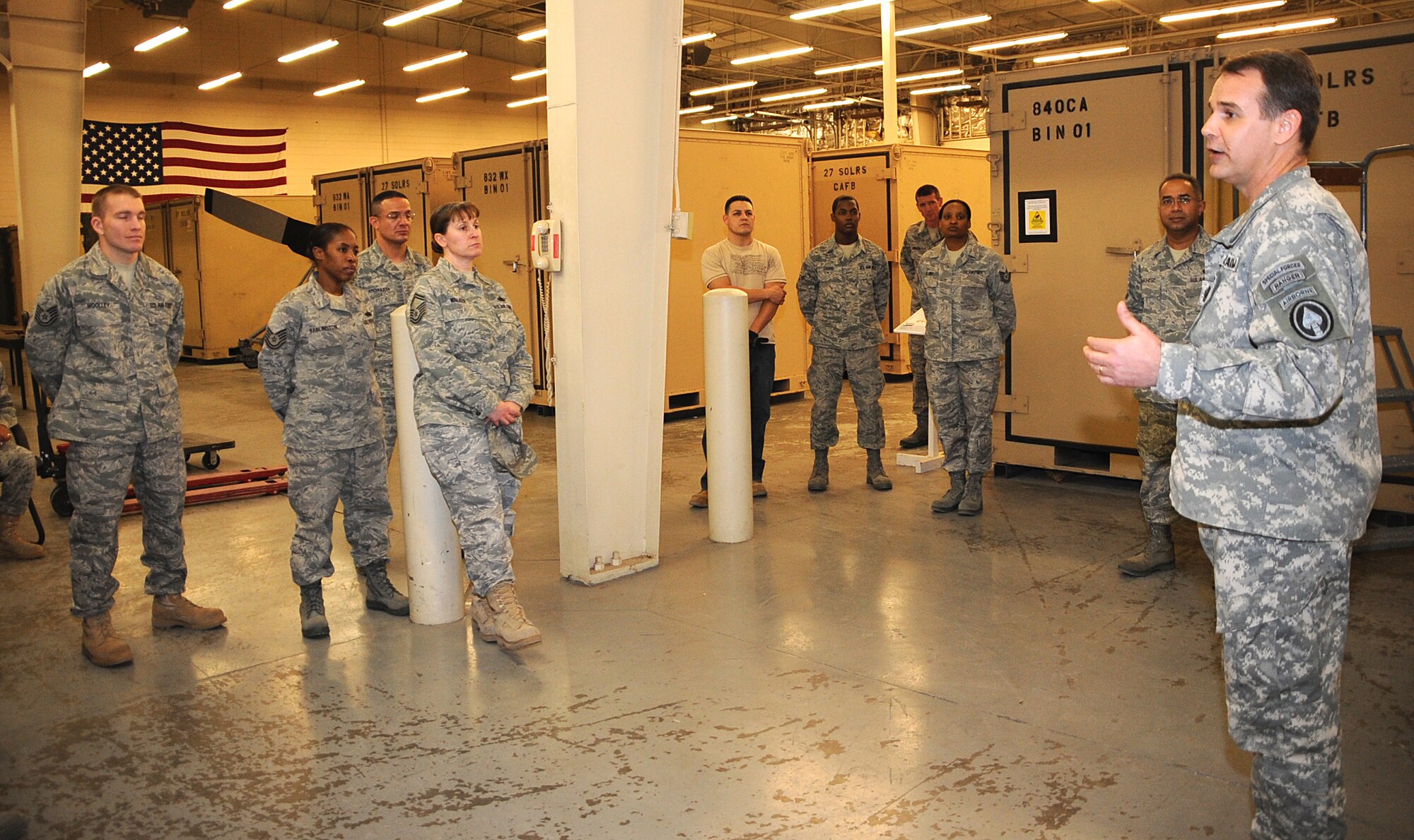 Command Sgt. Maj. James C. Faris, Joint Special Operations Command Senior Enlisted Leader, visits the 27th Special Operations Logistics Readiness Squadron Airmen at Cannon Air Force Base, N.M., March 3. In addition to his tour of the base and its assets, he encouraged Airmen to keep pushing the mission through. (U.S. Air Force photo by Airman 1st Class Maynelinne De la Cruz)