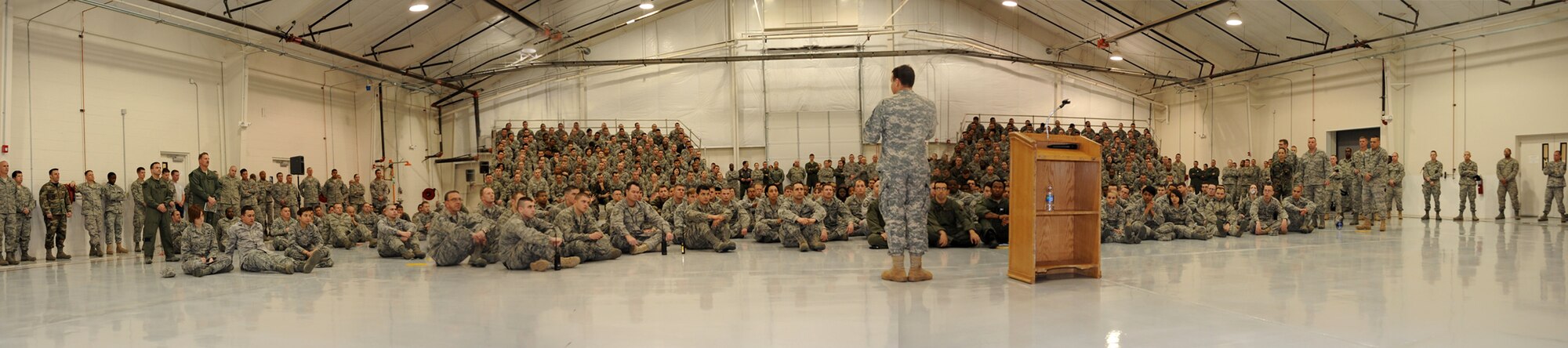 Command Sgt. Maj. James C. Faris, Joint Special Operations Command senior enlisted leader, visited Cannon Air Force Base, N.M. March 1 and toured the base's assets as an Air Force Special Operations wing. He spoke with Airmen during an all enlisted call  at hangar 196 about the importance of their mission as members of the 27th Special Operations Wing. (U.S. Air Force photo by Airman 1st Class Maynelinne De La Cruz)