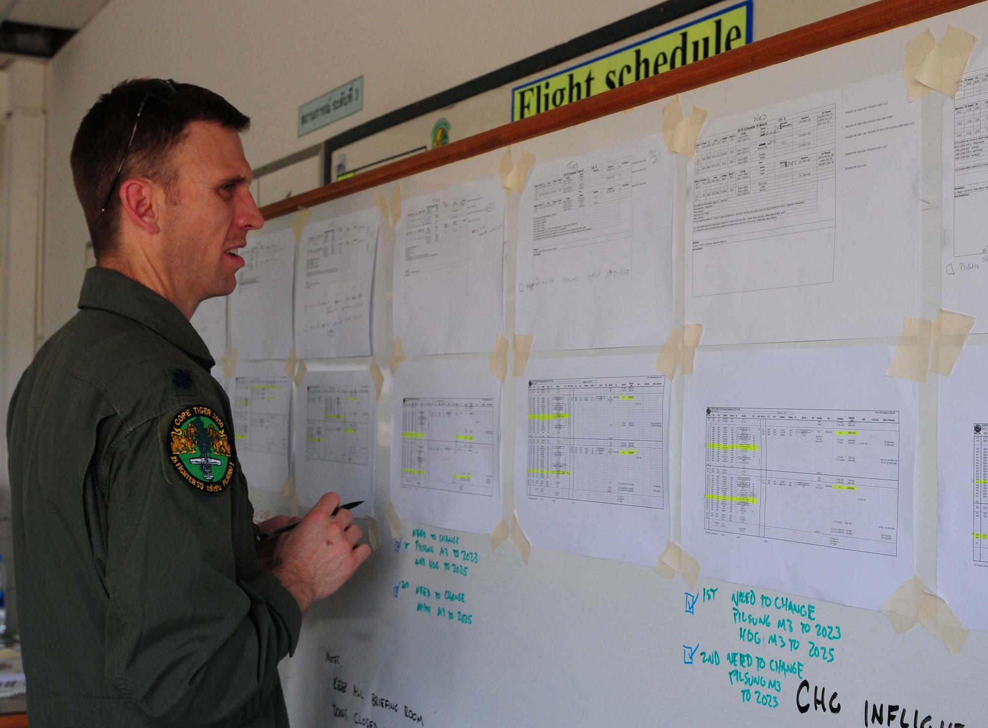 Lt. Col. Charles Wahl amends the flight schedule for A-10 Thunderbolt II operations at Udon Thani Royal Thai Air Force Base, Thailand, March 4 as part of Cope Tiger 2010.  Colonel Wahl is deployed to the exercise from the 25th Fighter Squadron at Osan Air Base, South Korea.  His squadron is participating in the annual, multilateral field training exercise involving the U.S. Air Force, Royal Thai Air Force and Army, and the Republic of Singapore Air Force March 1-12.  (U.S. Air Force photo/Capt. Genieve David)