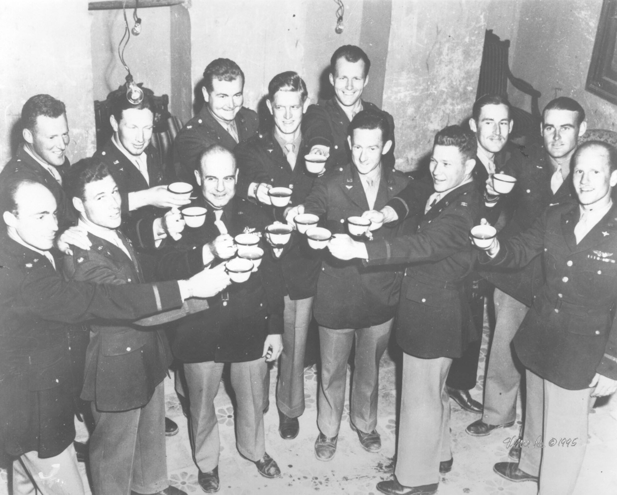 Members of the Doolittle Tokyo Raiders celebrate at an earlier reunion.  (Air Force Photo)