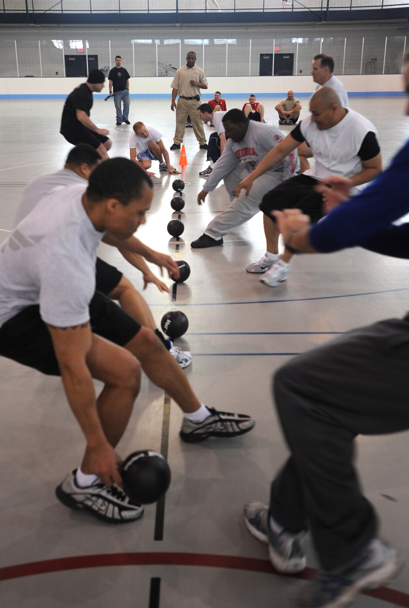 Airmen from the 319th Maintenance Group face-off against Airmen from the 319th Comptroller Squadron and 319th Air Refueling Wing staff agencies in a game of dodge ball Feb. 25 at the Grand Forks Air Force Base, N.D., Fitness Center during the 2010 Winter Bash. The Winter Bash was created to increase esprit-de-corps and allow Airmen to take a break from their day to day work environments. The wing also holds a Summer Bash in August. (U.S. Air Force photo by Staff Sgt. Suellyn F. Nuckolls)