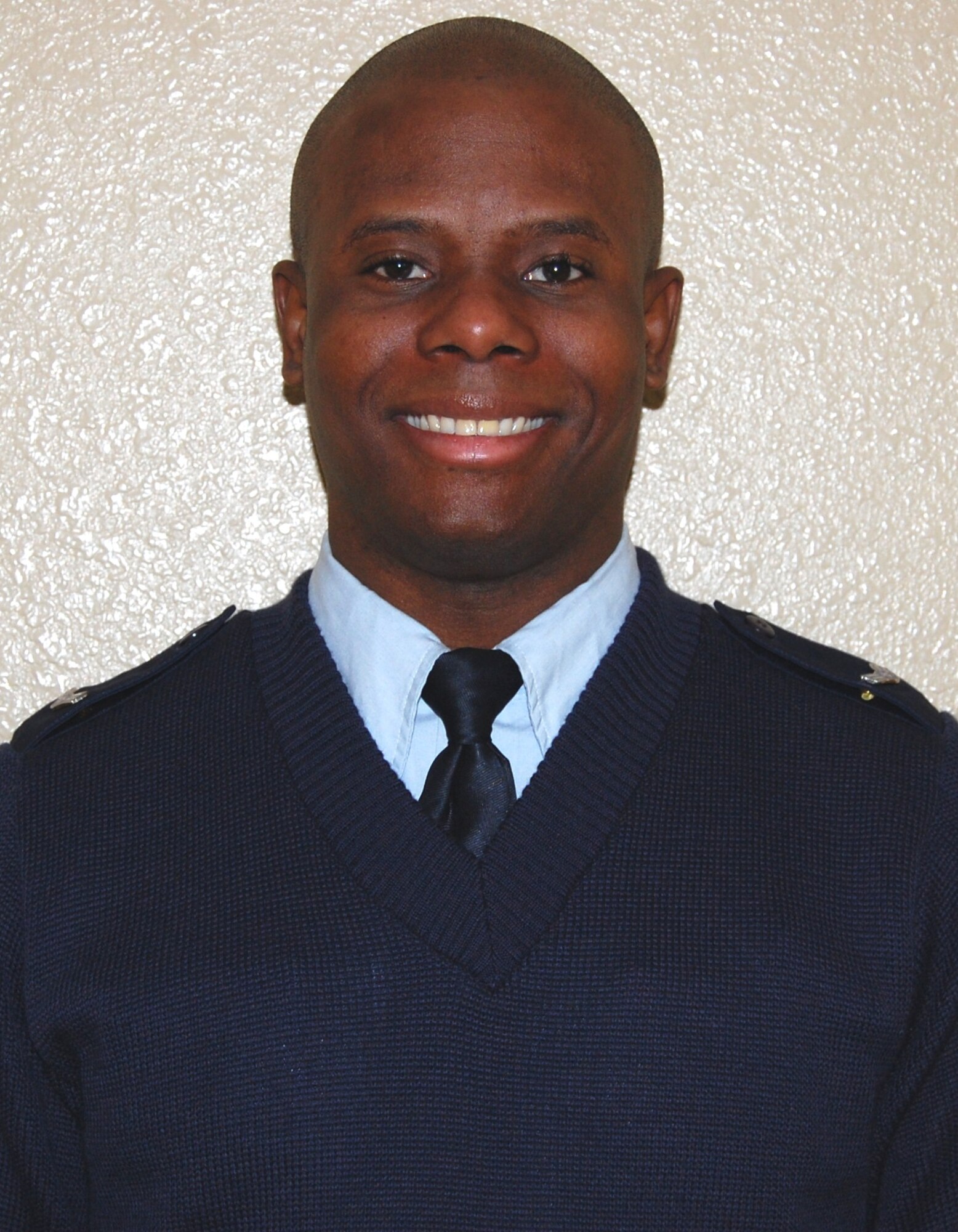 Almost 26 years of singing have paid off for Airman 1st Class Hansil Jules, who learned Feb. 17 that he had been selected as a member of the 2010 Air Force Tops in Blue unit. He begins rehearsals Monday for the 2010 tour that starts in late May.
  (U.S. Air Force photo by Steve Pivnick)
