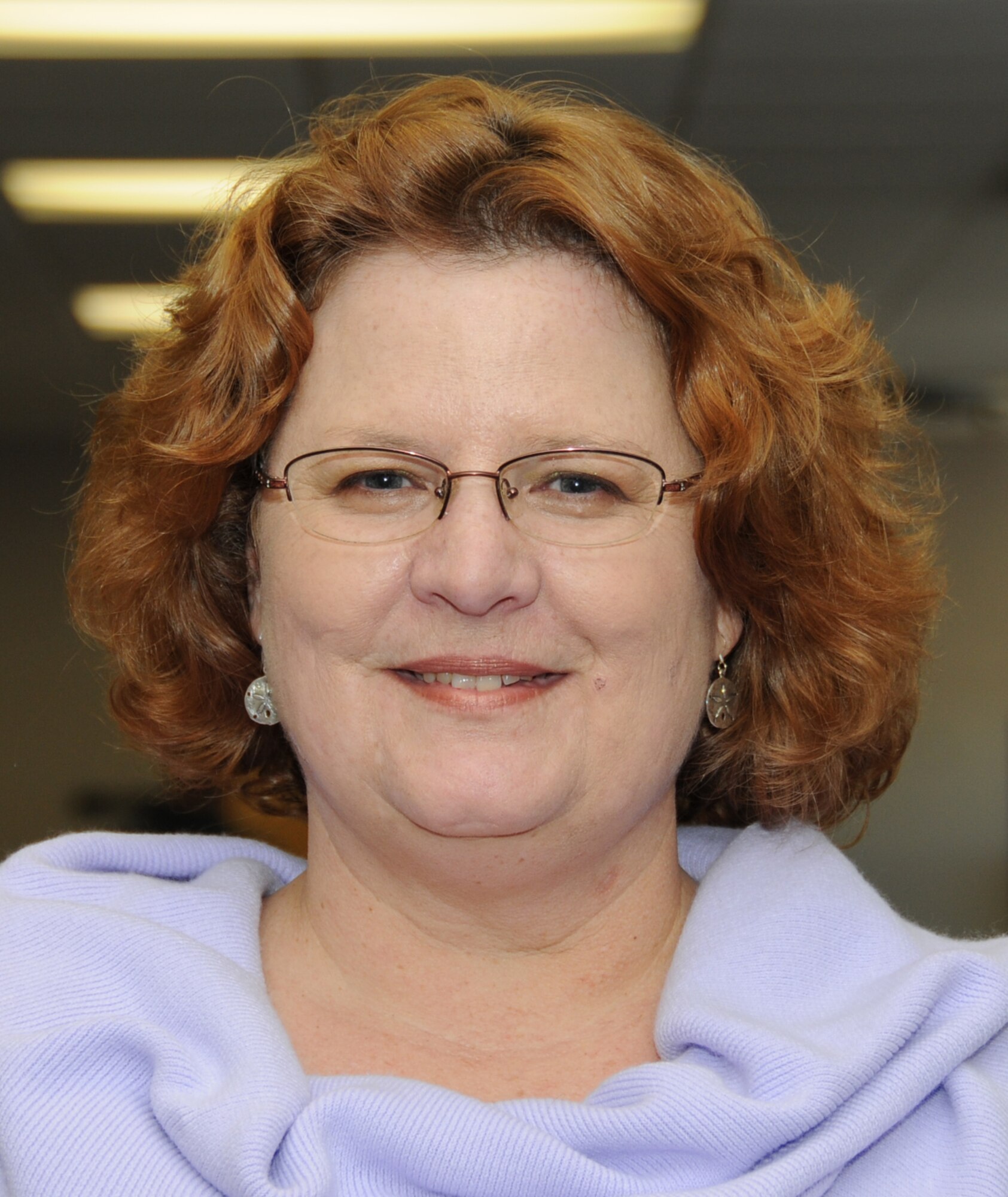 Angela Cutrer, contract journalist, won first place in the contractor/stringer article category for a feature on Keesler’s amateur radio club.    (U.S. Air Force photo by Kemberly Groue)
