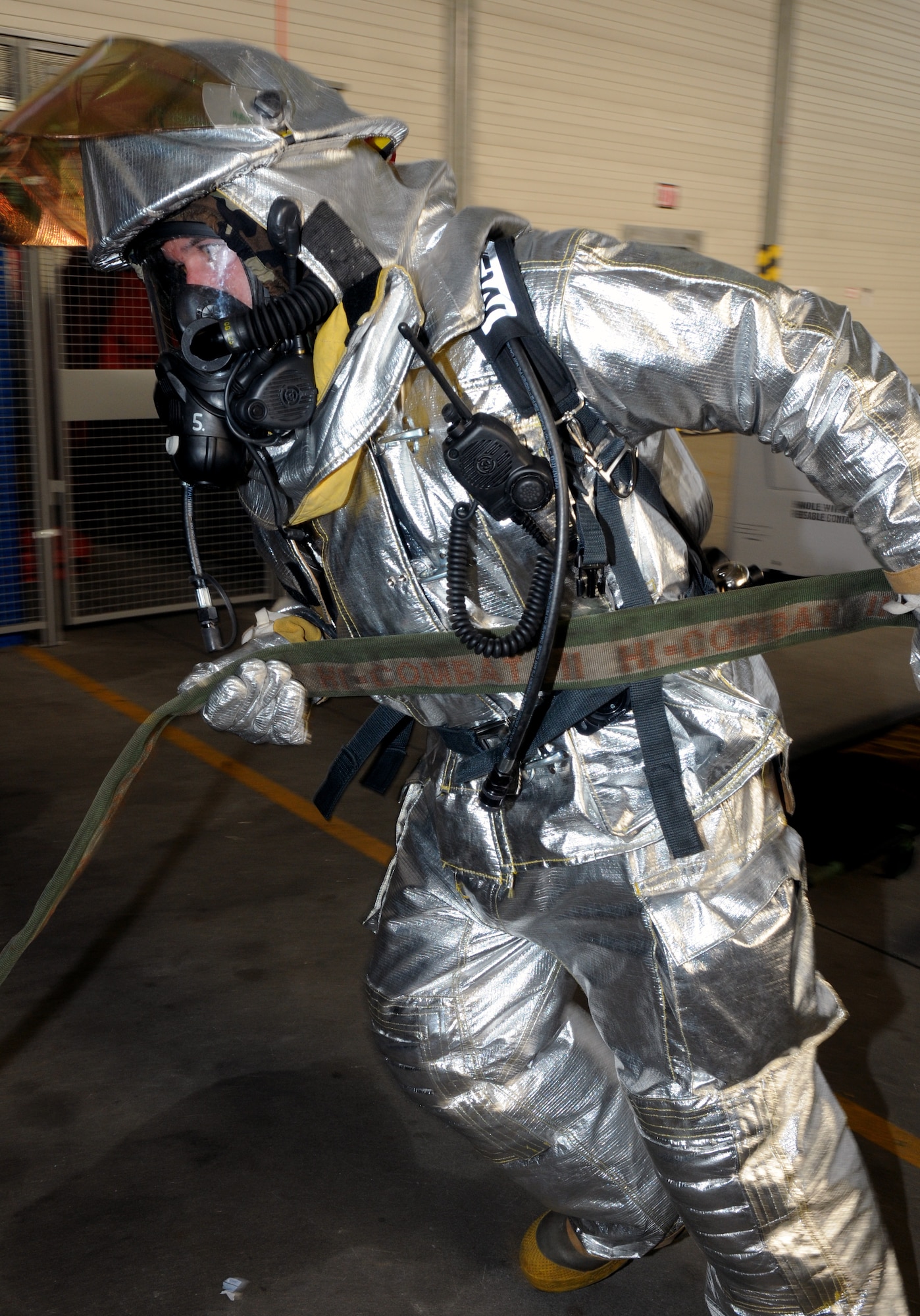 SPANGDAHLEM AIR BASE, Germany – A 52nd Civil Engineer Squadron firefigher, responds to a simulated fire during Operation Saber Crown 10-04 March 3. The Phase II exercise evaluated the wing’s self-aid and buddy care execution, emergency response and chemical, biological, radiological, nuclear and explosive procedures to prepare for the upcoming NATO force evaluation. (U.S. Air Force photo/Airman 1st Class Staci Miller) 