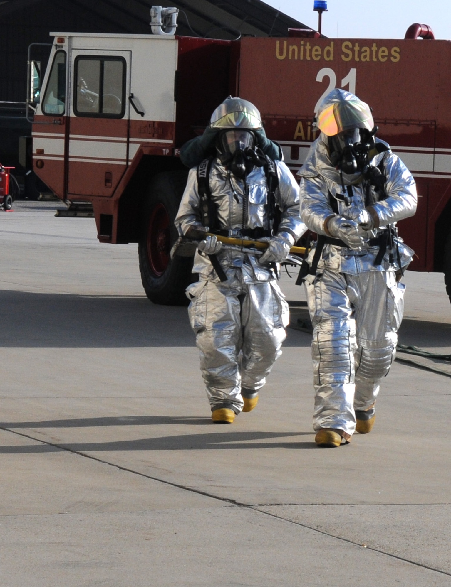 SPANGDAHLEM AIR BASE, Germany – 52nd Civil Engineer Squadron firefighters respond to a simulated fire during Operation Saber Crown 10-04 March 3. The Phase II exercise evaluated the wing’s self-aid and buddy care execution, emergency response and chemical, biological, radiological, nuclear and explosive procedures to prepare for the upcoming NATO force evaluation. (U.S. Air Force photo/Airman 1st Class Staci Miller)