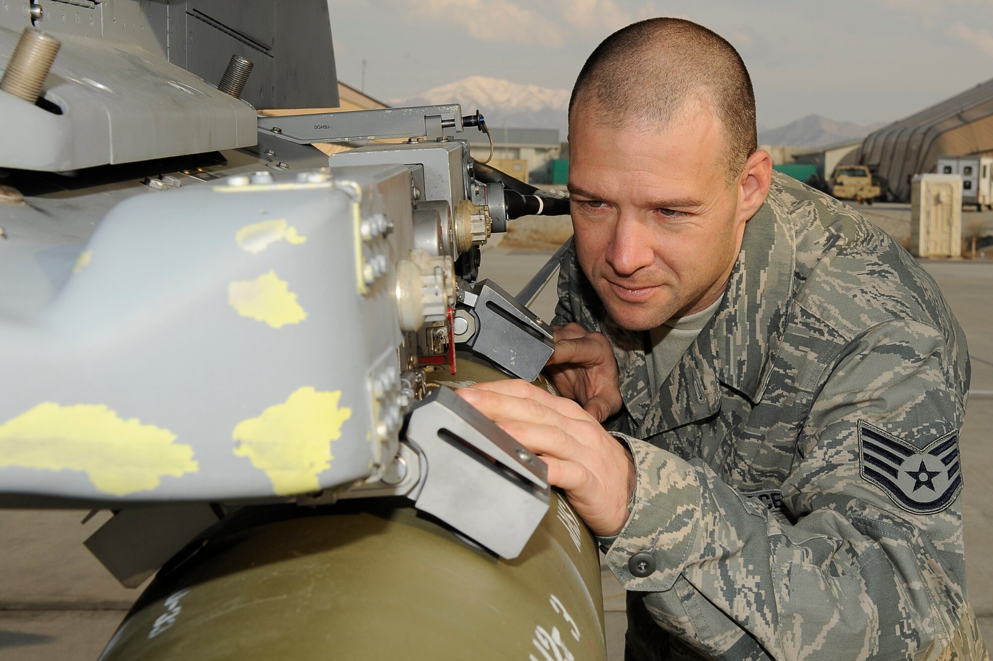 Staff Sgt. Michael Greer, 34th Aircraft Maintenance Squadron, is the Warrior of the Week. He is an aircraft armament systems specialist deployed from Hill Air Force Base, Utah and from Moss Point Miss. 

His primary duty is to load and unload munitions and troubleshoot and repair weapons systems on the F-16 Fighting Falcon. 

When asked his thought on being named Warrior of the Week Sergeant Greer replied, “It gives other people a chance to see what we do on the flightline everyday and it highlights my careerfield.”

Sergeant Greer explains the importance of his job by saying, “It keeps servicemembers on the ground safe and allows them to focus on their mission.” 

His supervision stated, Sergeant Greer has a “Take the Bull by the Horns” job and leadership attitude. He continually steps up no matter what he is tasked with to get the mission accomplished. 

Sergeant Greer stepped up as the weapons section PTL, as a certified cross fit trainer he took the weapons section from a 68 percent pass rate to 94 percent pass rate of the 455 AEW fitness assessment in just a matter of weeks greatly improving the overall health and well being of the entire section. He has volunteered numerous hours at the USO stocking the refrigerator and has volunteered time and donated equipment at the “Rock” gym for a circuit class. Sergeant Greer continually sets the standard for the 34 EAMU weapons section. He is definitely an example others follow. 
 (U.S. Air Force photo by/ Tech. Sgt. Jeromy K. Cross)




