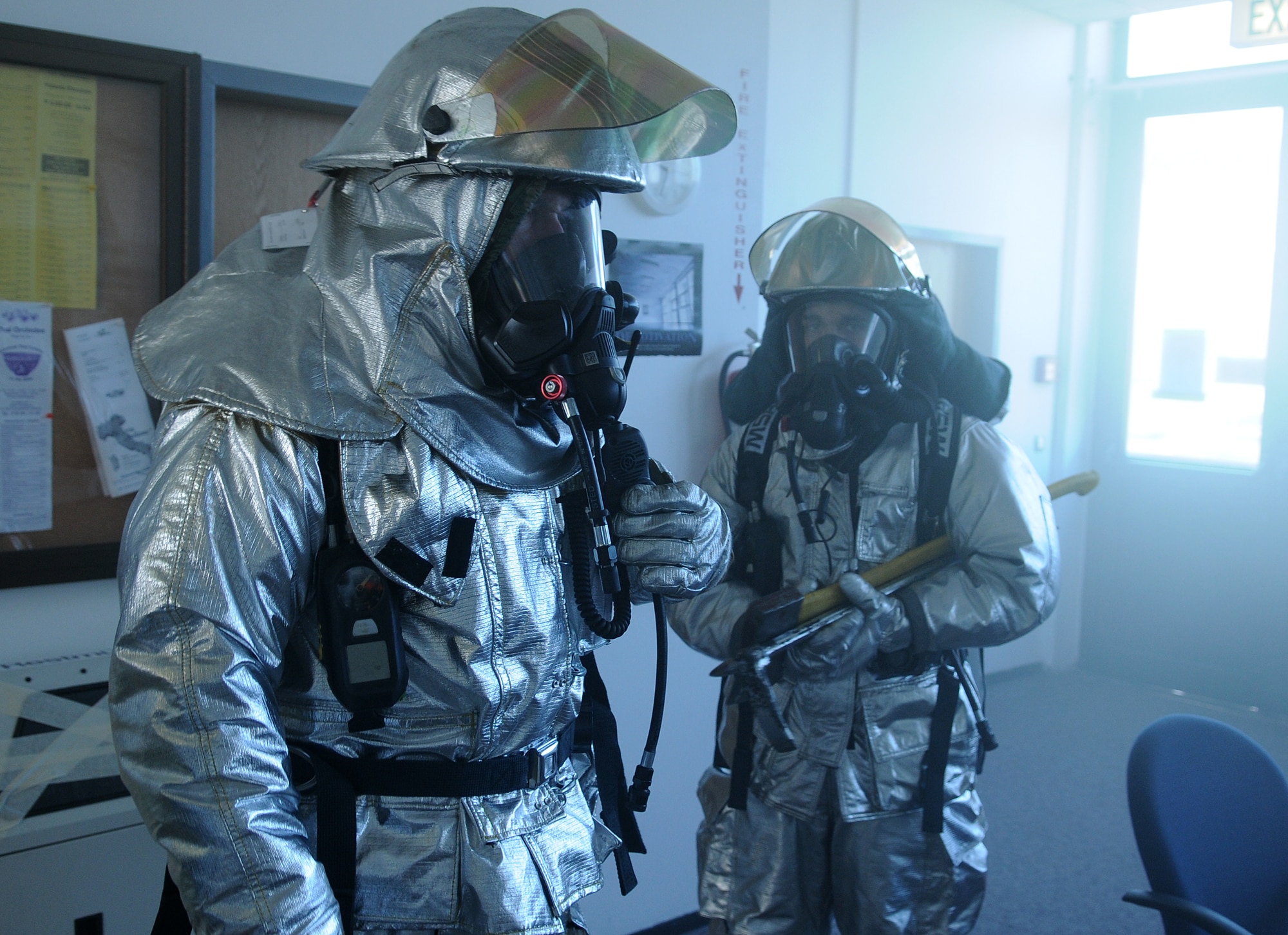 SPANGDAHLEM AIR BASE, Germany – Tech. Sgt. Jeremiah Hansen, 52nd Civil Engineer Squadron firefighter, checks for victims in a building after a simulated fire during Operation Saber Crown 10-04 here March 3. Members of the 52nd Fighter Wing participated in the Phase II exercise to evaluate the wing’s ability to operate in a chemical, biological, radiological, nuclear and explosive environment and to prepare the wing for the NATO force evaluation this summer. (U.S. Air Force photo/Senior Airman Nathanael Callon)
