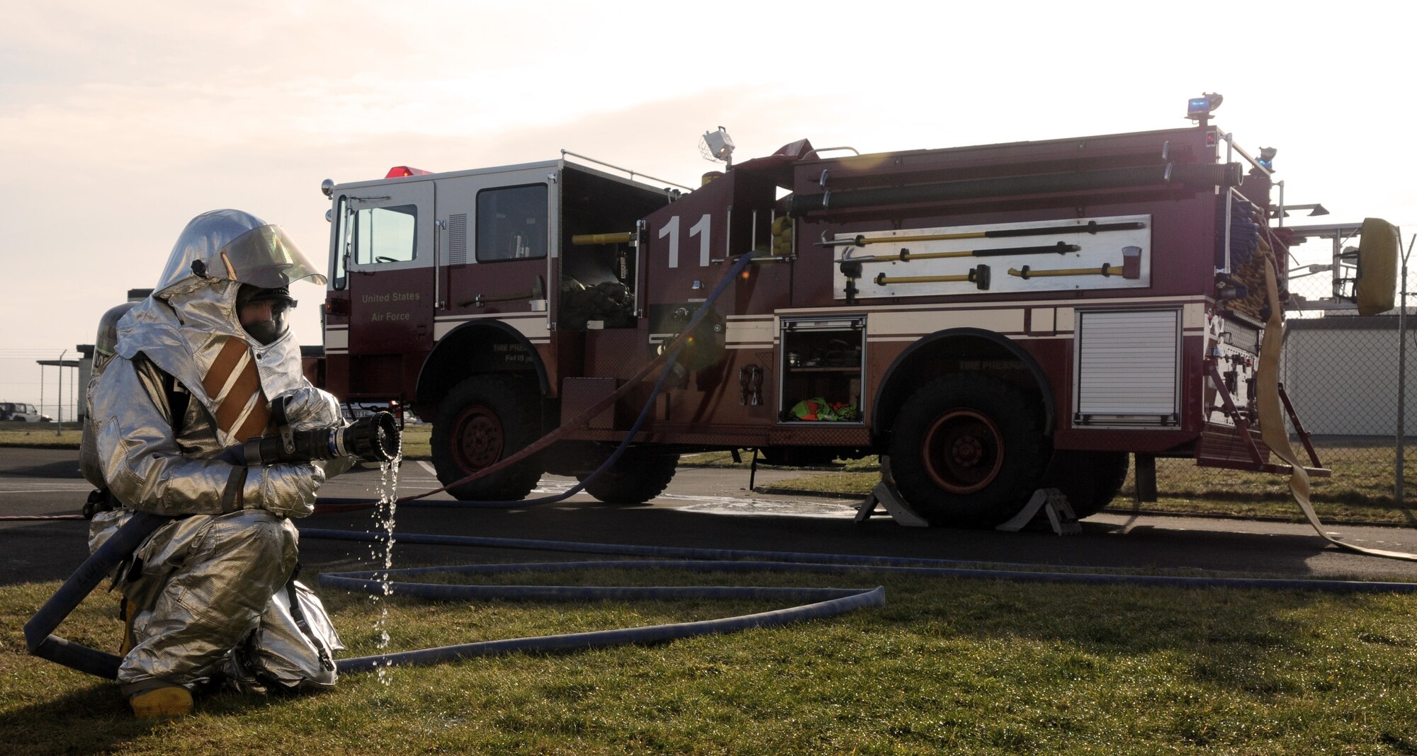 SPANGDAHLEM AIR BASE, Germany – Staff Sgt. Zachery McCormick, Civil Engineer Squadron firefigher, responds to a simulated fire during Operation Saber Crown 10-04 March 2. The Phase II exercise evaluated the wing’s SABC execution, emergency response and chemical, biological, radiological, nuclear, and explosive procedures to prepare for the upcoming NATO force evaluation. (U.S. Air Force photo/Airman 1st Class Staci Miller) 