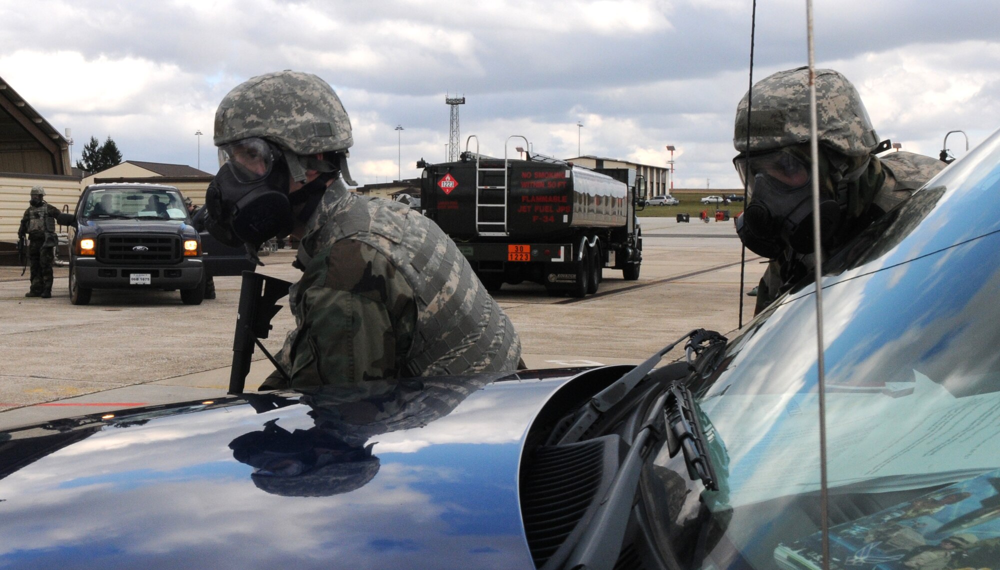 SPANGDAHLEM AIR BASE, Germany – Members of the 52nd Security Forces Squadron respond to a simulated vehicle-borne improvised explosive device during Operation Saber Crown 10-04 March 1. The Phase II exercise evaluated the wing’s emergency response and Chemical, Biological, Radiological, Nuclear, and Explosive Events procedures to prepare for the upcoming NATO force evaluation. (U.S. Air Force photo/Airman 1st Class Staci Miller)