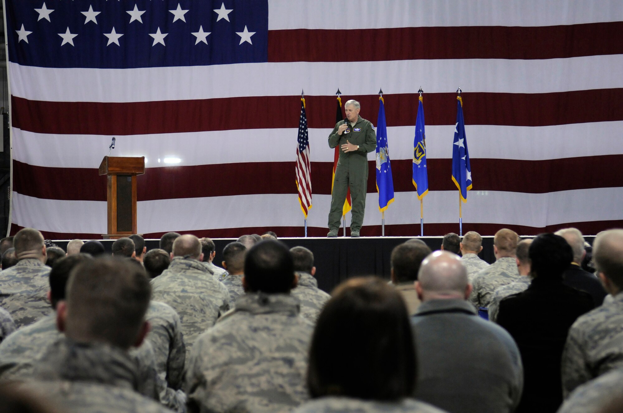 Gen. Roger A. Brady, U.S. Air Forces in Europe commander, speaks to the 86th Airlift Wing, Ramstein Air Base, Germany, during a wing-wide call, March 2. Though a frequent customer of many of the services the wing provides due to his residency here, the general's visit to the wing this time was special as it focused on recognizing various wing Airmen and relaying key messages in regards to the future of the force.  (U.S. Air Force Photo by: Airman 1st Class Brittany Perry)