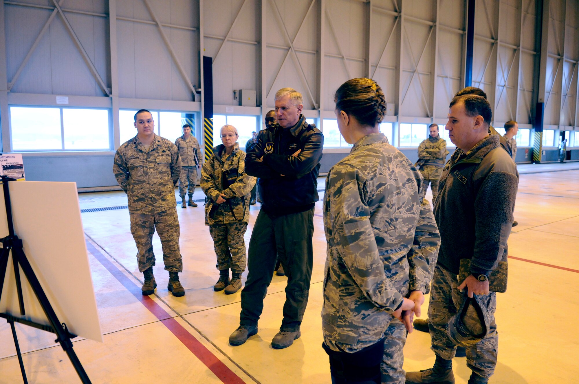 Gen. Roger A. Brady, U.S. Air Forces in Europe commander, receives a briefing from members of the 86th Material Maintenance Squadron during his visit to the 86th Airlift Wing, at Ramstein Air Base Germany, March 2.  The 86th MMS is actively supporting the major deployment surge to Afghanistan by packaging and transporting more than six million pounds of War Readiness Material from their warehouse in Luxembourg.   (U.S. Air Force Photo by: Airman 1st Class Brittany Perry)