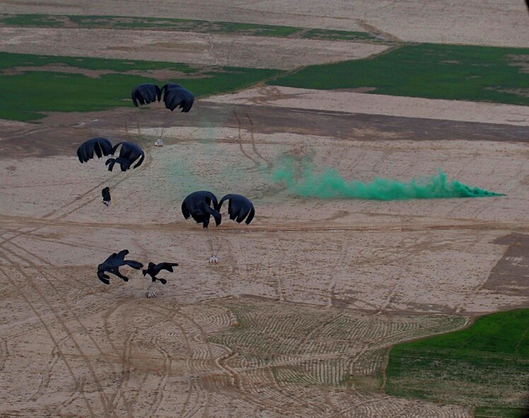 U.S. Air Force Airmen from the 774th Expeditionary Airlift Squadron, deployed to Bagram Airfield, Afghanistan, airdropped four low-cost low-altitude re-supply bundles from a C-130H Hercules, Feb. 6, 2010. This mission marked the first time an Air Force C-130 crew airdropped LCLA bundles in a combat zone. (U.S. Air Force photo/Staff Sgt. Angelita Lawrence/released)