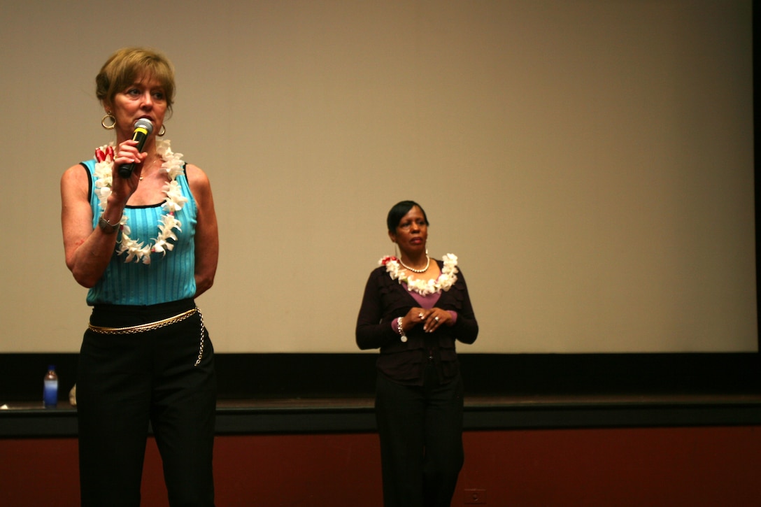(From left to right) Annette Conway and Liz Kent, the commandant and sergeant major of the Marine Corps' wives, respectively, speak with military spouses Mar. 5 at the Marine Corps Base Hawaii Kaneohe Bay Theater.  A major concern among her audience was Furlough Friday's and the education in Hawaii compared to the rest of the United States.