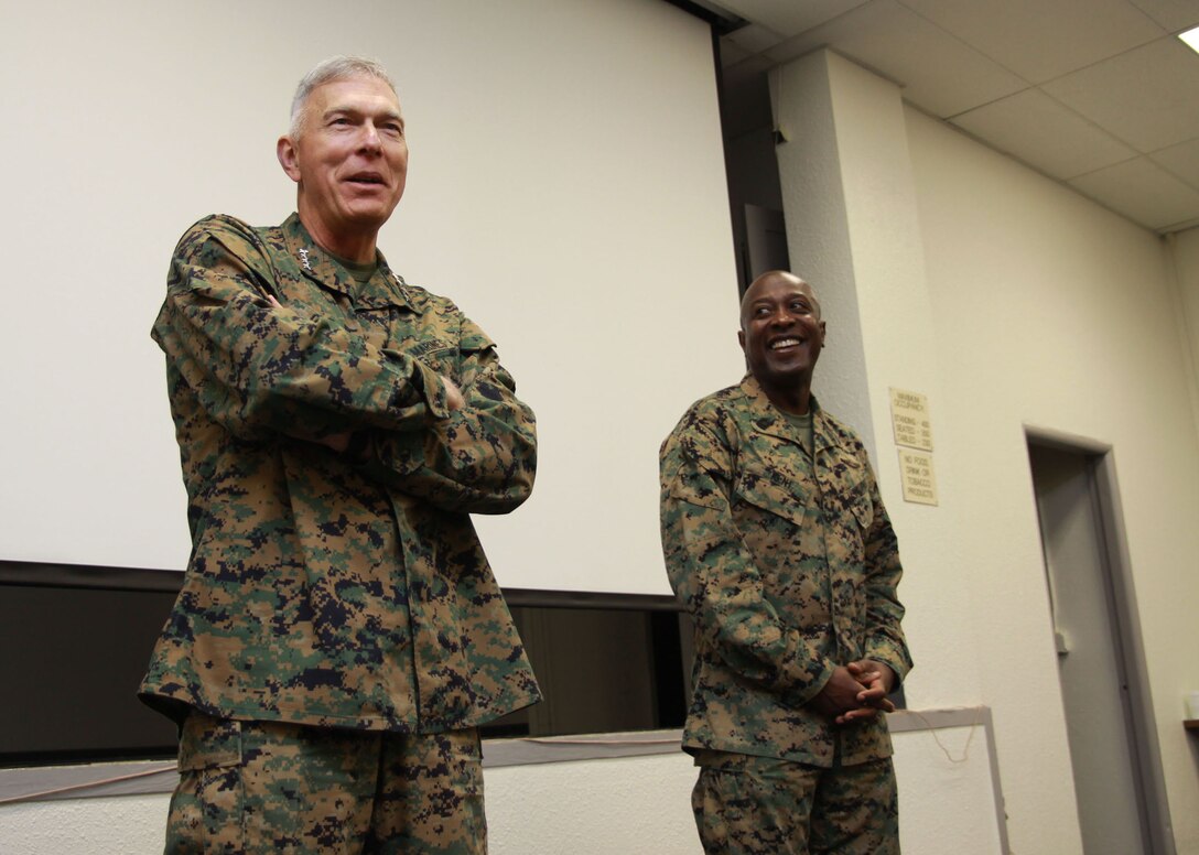 Commandant of the Marine Corps Gen. James T. Conway and Sgt. Maj. of the Marine Corps Carlton W. Kent address Marines at the Pollock Theater here Feb. 5. After speaking to the Marines about Iraq, Afghanistan and issues the Corps is facing today, the Corps’ top leaders opened the floor to questions from the audience. (Official U.S. Marine Corps photo by Cpl. Cristina Noelia Gil)