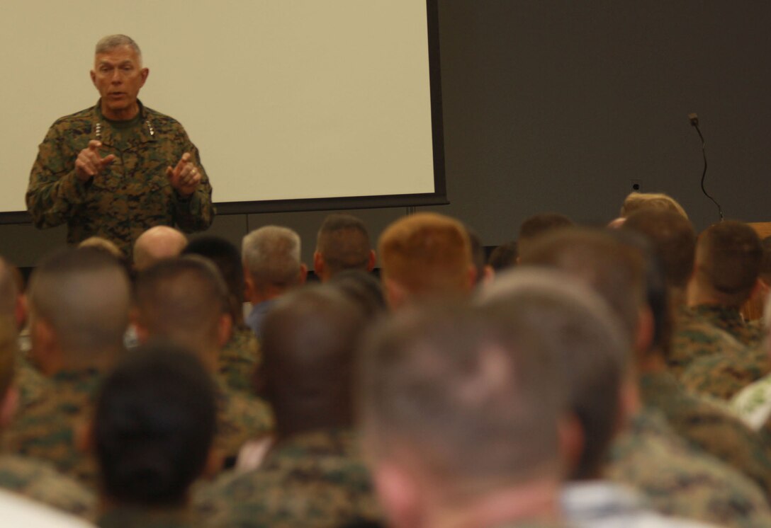 General James T. Conway, commandant of the Marine Corps, addresses more than 200 Marines at the Pollock Theater Feb. 5. The commandant and sergeant major of the Marine Corps addressed a number of concerns including the Corps’ future in Afghanistan, tattoo policies and the economy’s effect on the Marine Corps. (Official U.S. Marine Corps photo by Cpl. Cristina Noelia Gil)