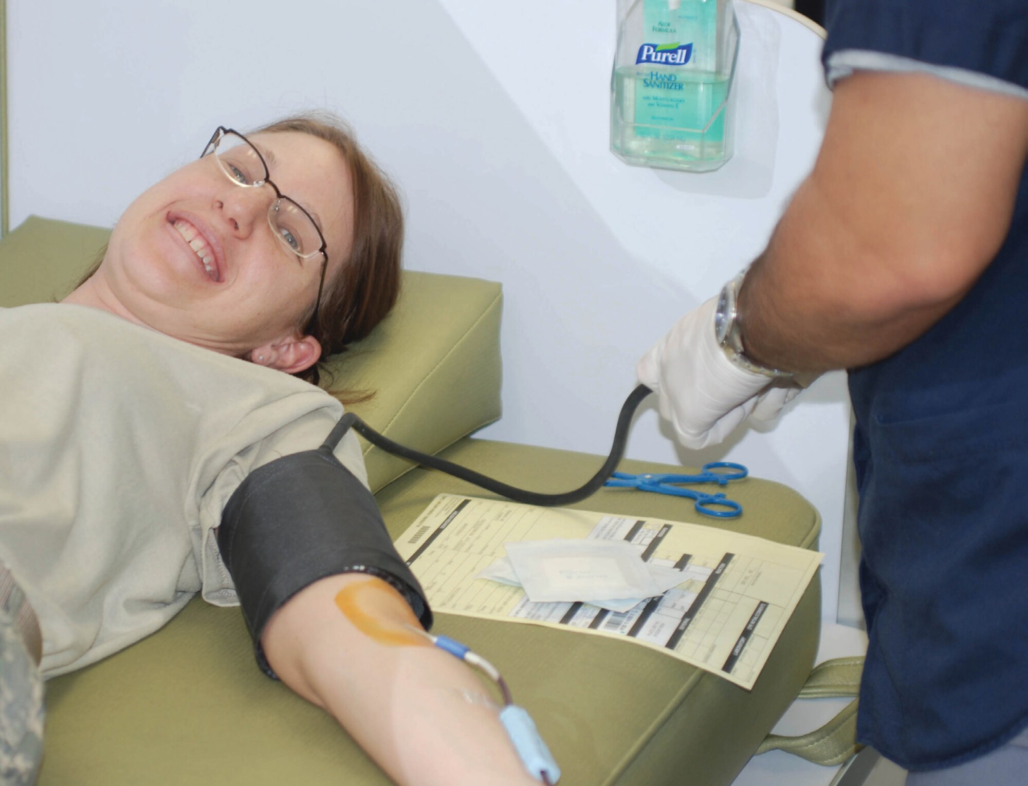 Staff Sgt. Lisa Junk, an aviation resource manager in the 729th Airlift Squadron, donates blood Feb. 21 during a blood drive at March Air Reserve Base. (U.S. Air Force photo by Staff Sgt. Kevin Chandler)