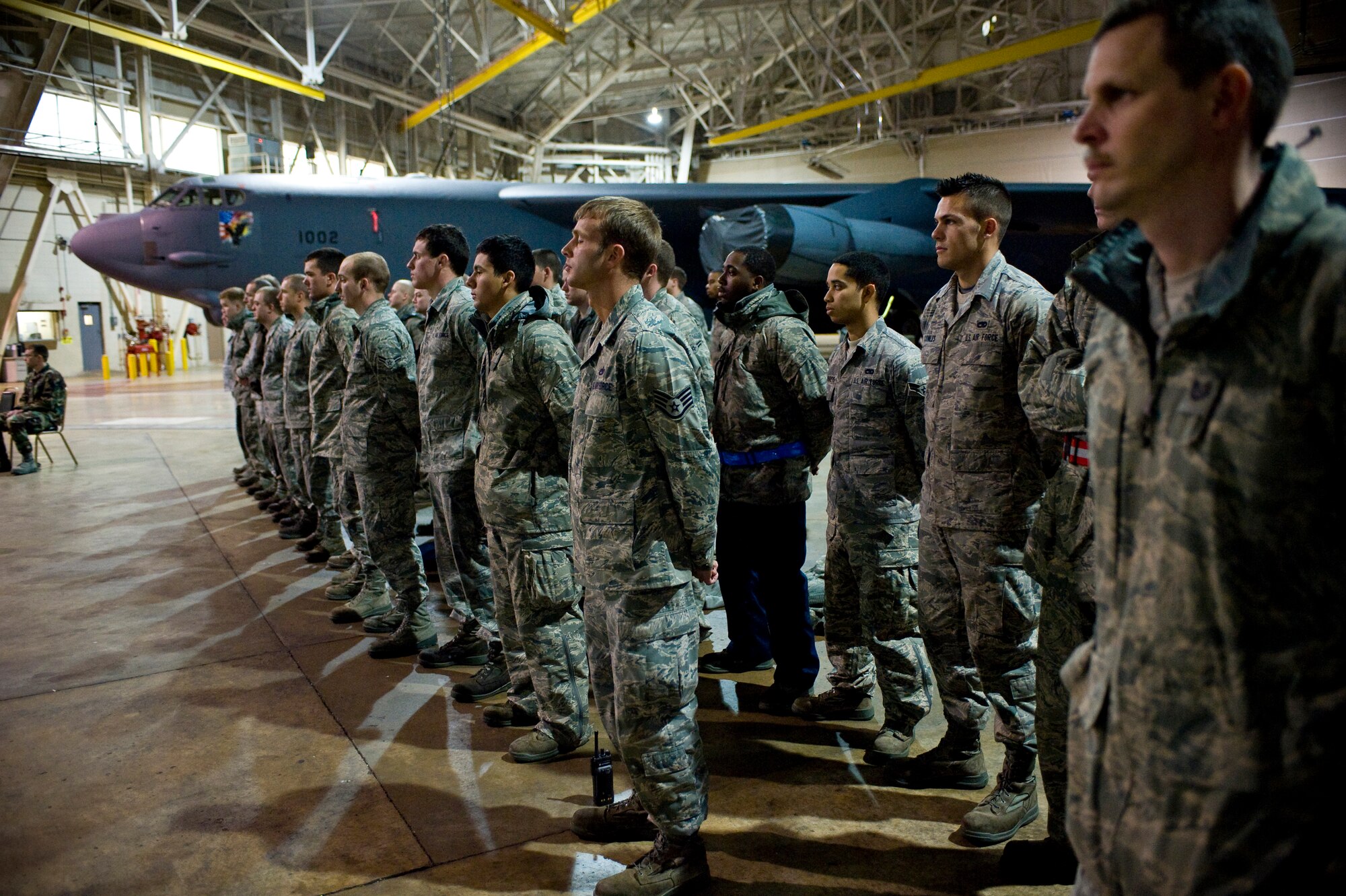 BARKSDALE AIR FORCE BASE, La. -- Airmen from the 2d Aircraft Maintenance Squadron watch as a select few of their peers are appointed as Dedicated Crew Chiefs Feb. 26. The DCC program assigns top maintainers to oversee all maintenance of a specific aircraft. (U.S. Air Force photo by Airman 1st Class Chad Warren) (RELEASED)