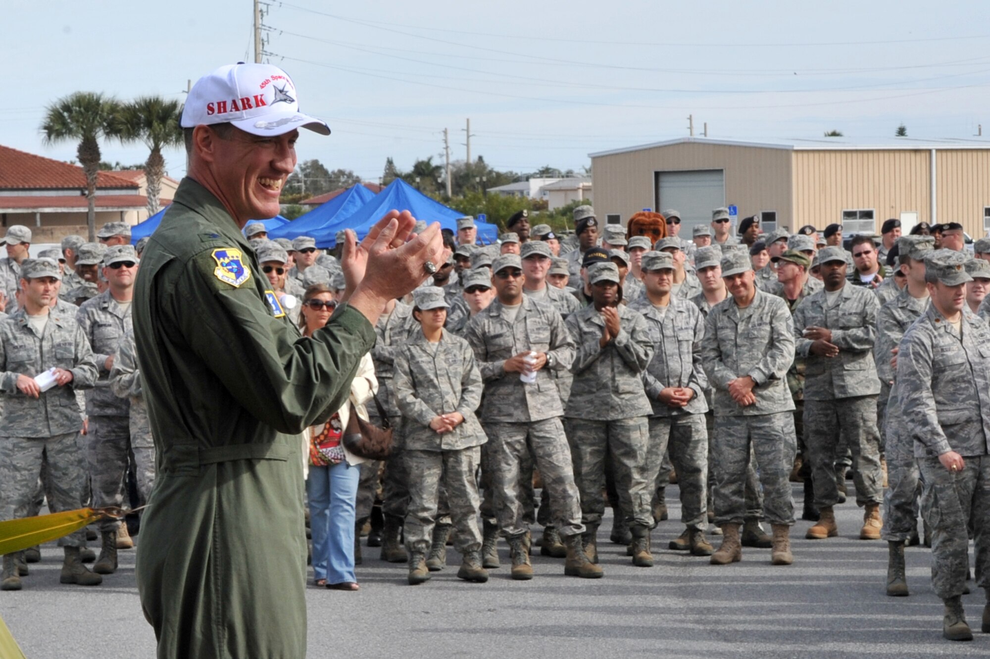 Col Wilson, commander of the 45 Space Wing, cheers on Guardian Challenge team. 