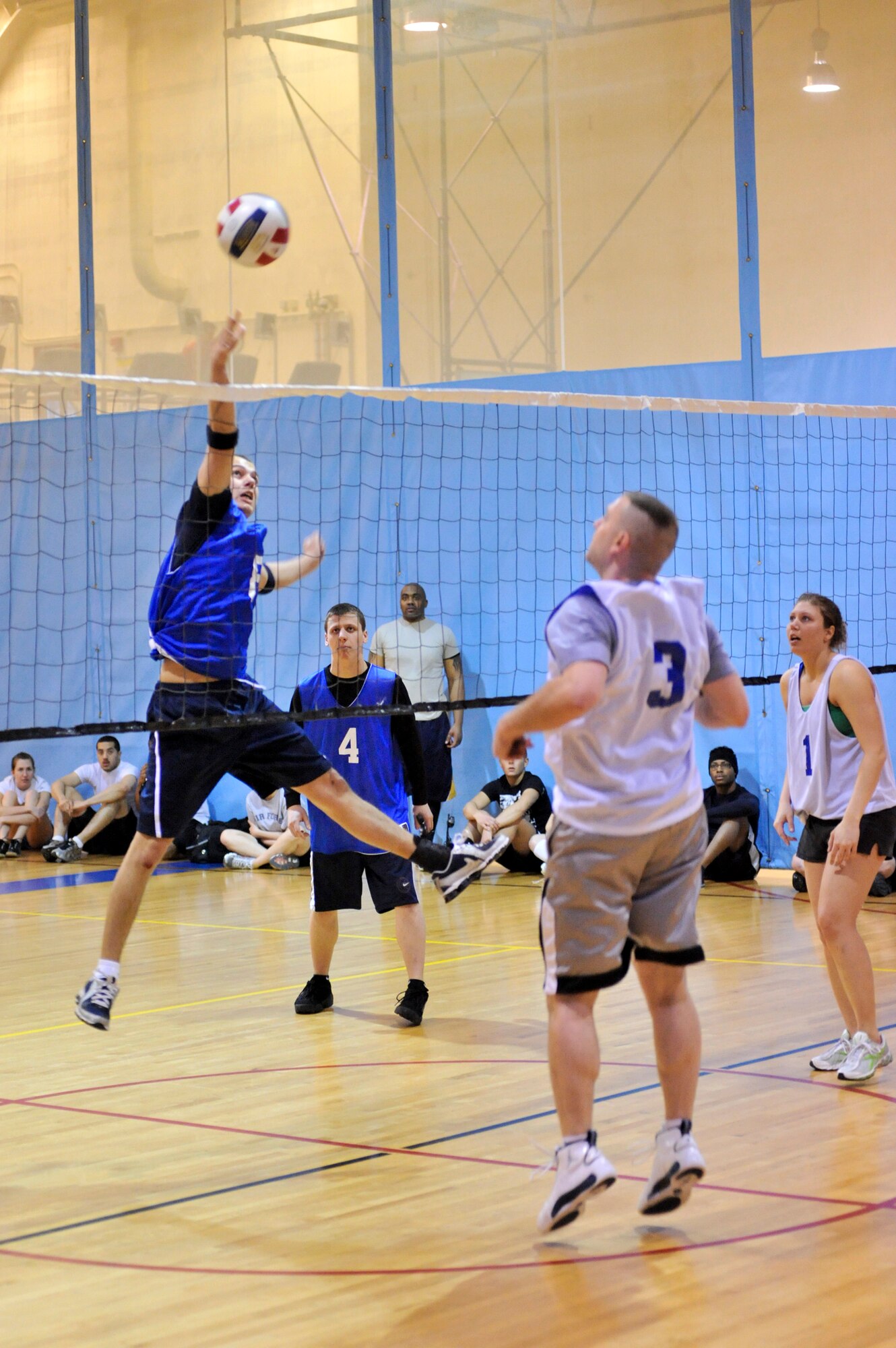 ELMENDORF AIR FORCE BASE, Alaska – A member from the 3rd Security Forces Squadron spikes the volleyball over the net during a game against the 732nd Air Mobility Squadron March 3, at Elmendorf’s Fitness Center. The 732nd AMS won two straight sets, with a score of 25-18 and 25-14, to win the matchup between the two teams during intramural play. (Air Force photo by Airman 1st Class Christopher Gross)