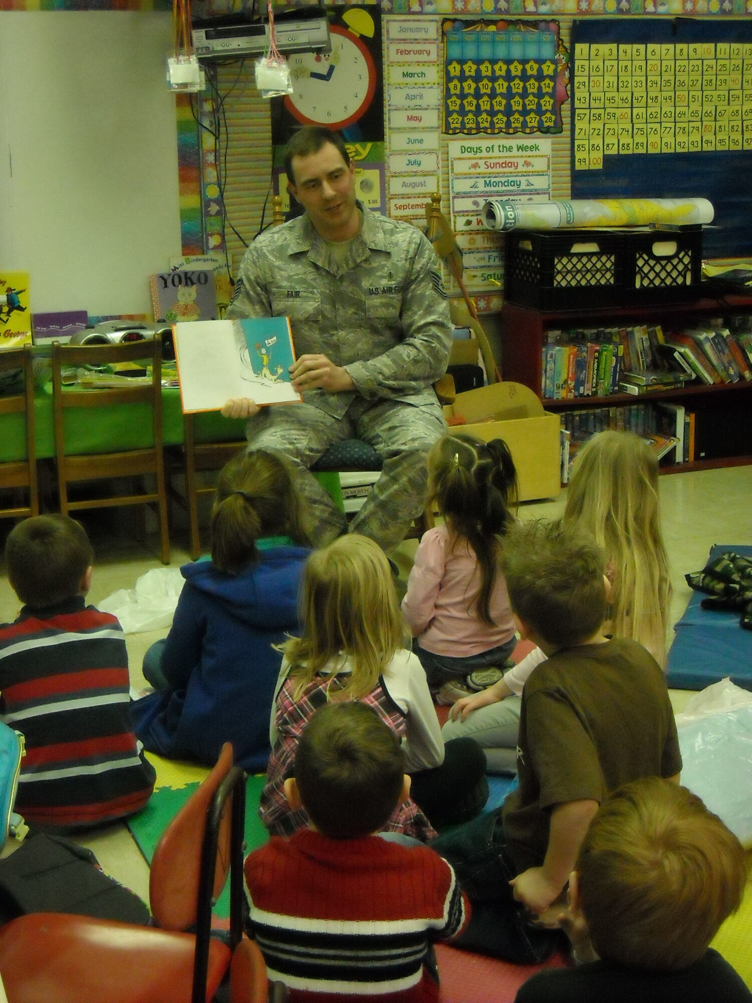 Tech. Sgt. Brian Fair reads Dr. Suess book to a class at New Union Elementary in Manchester as a part of Read Across America. (Photo provided)