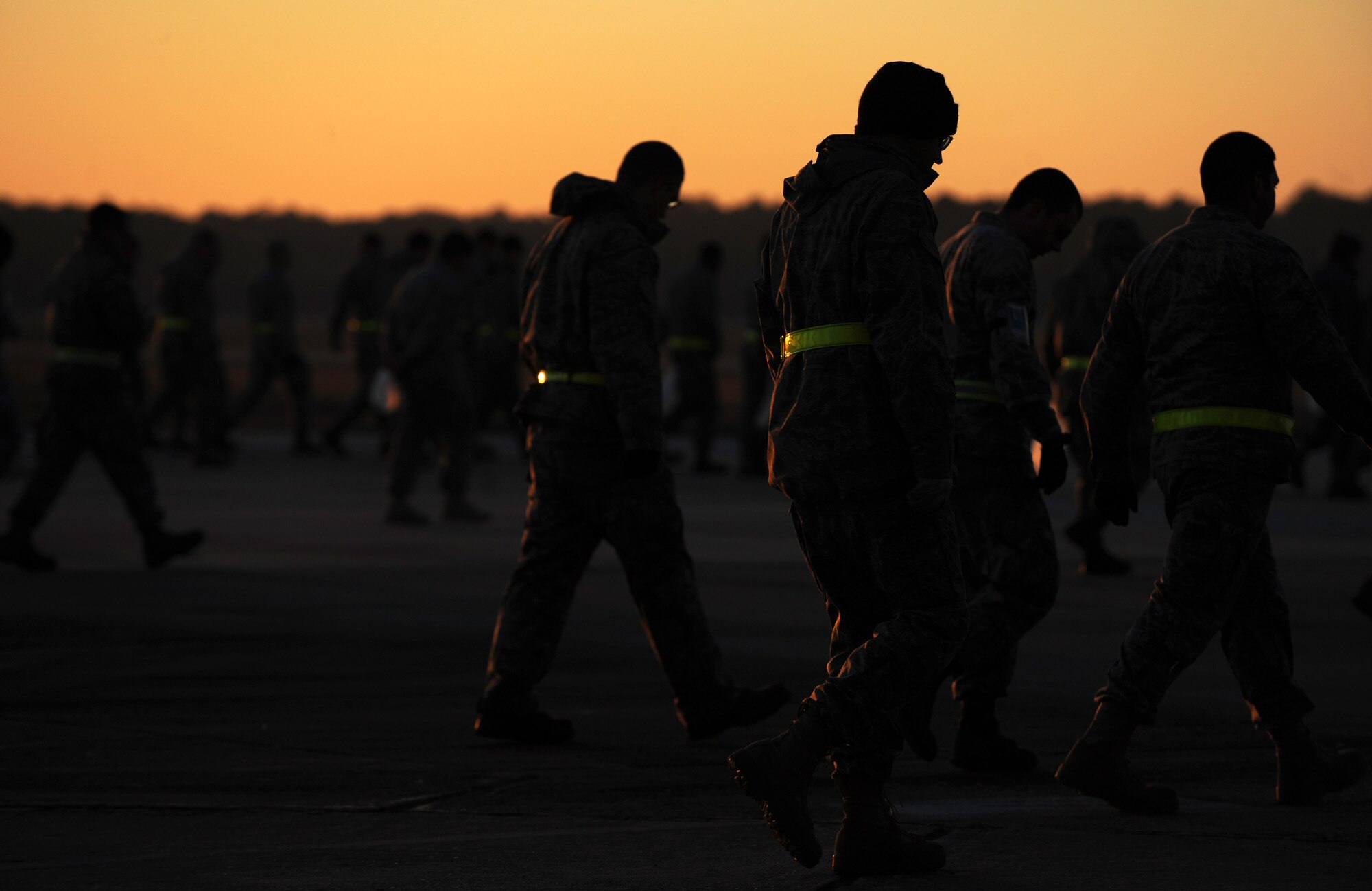 MOODY AIR FORCE BASE, Ga. -- In preparation for the Phase I Operational Readiness Inspection scheduled for March 8 to 12, Airmen flood the flightline to participate in a foreign object debris walk here March 5. The main purpose for performing a FOD walk is to prevent foreign objects and debris located on the flightline from damaging aircraft. (U.S. Air Force photo by Airman 1st Class Joshua Green)  