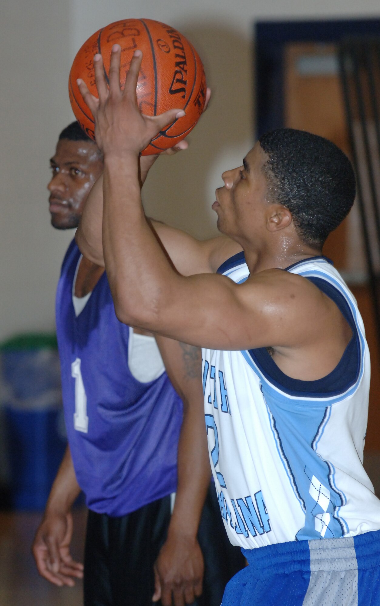 LANGLEY AIR FORCE BASE, Va. -- Air Force Targeting Center Small Forward Drew Colen prepares to shoot a free-throw in an intramural basketball play-off game March 4 at the Shellbank Fitness Center. AFTC won the game, 65-58. (U.S. Air Force photo/Airman 1st Class Jason J. Brown)
