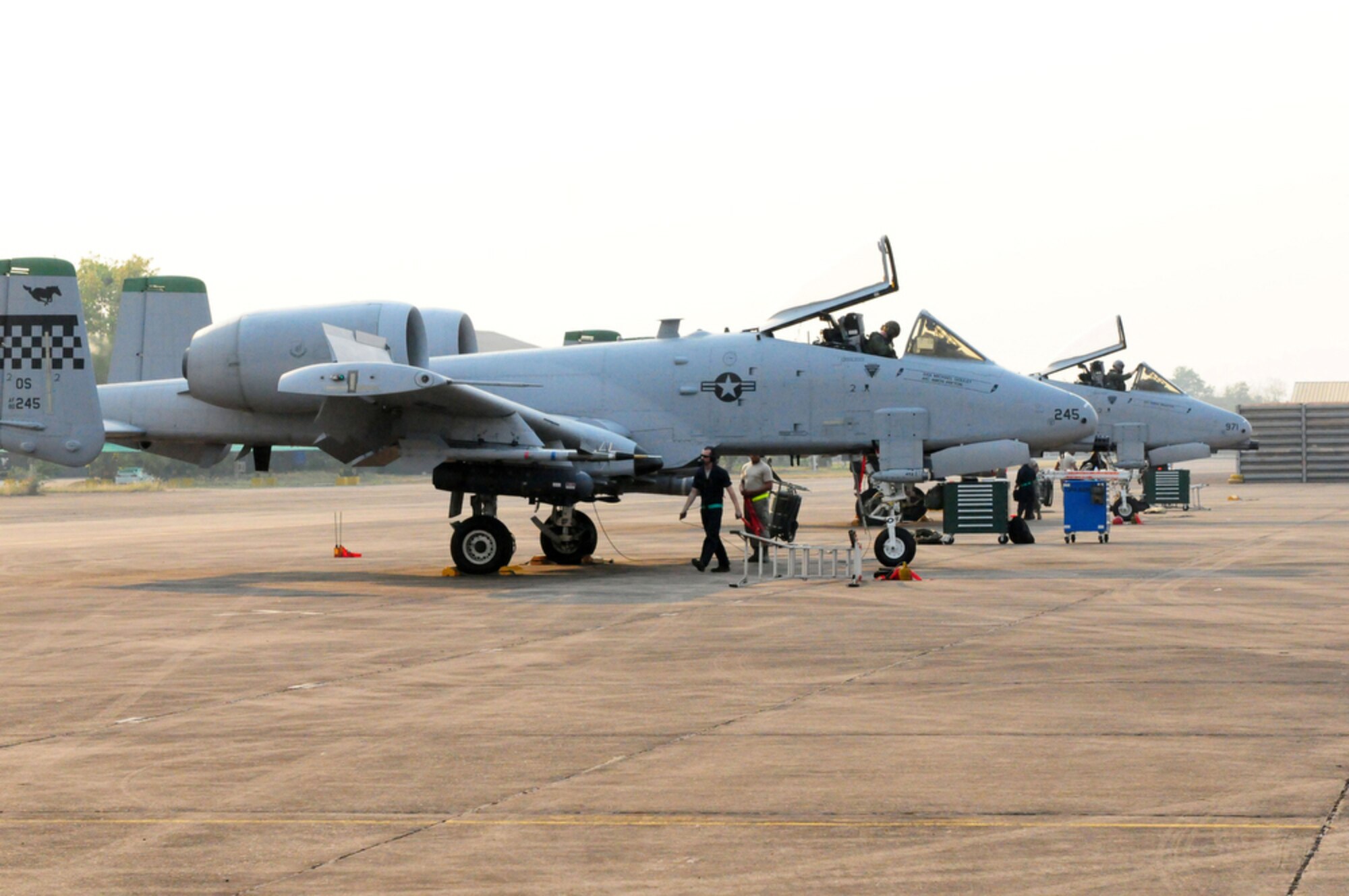 A-10 Thunderbolt II crew chiefs and weapons loaders prepare their Osan Air Base, South Korea, jets for shutdown after their return from a Cope Tiger 2010 training mission at Udon Thani Royal Thai Air Force Base, Thailand, on March 5.  Cope Tiger is an annual, multilateral aerial large force exercise conducted in Thailand that includes humanitarian and civic assistance programs. This year?s exercise takes place primarily at Udon Thani and Korat Royal Thai Air Force Bases. (U.S. Air Force photo/Tech. Sgt. Cohen A. Young)