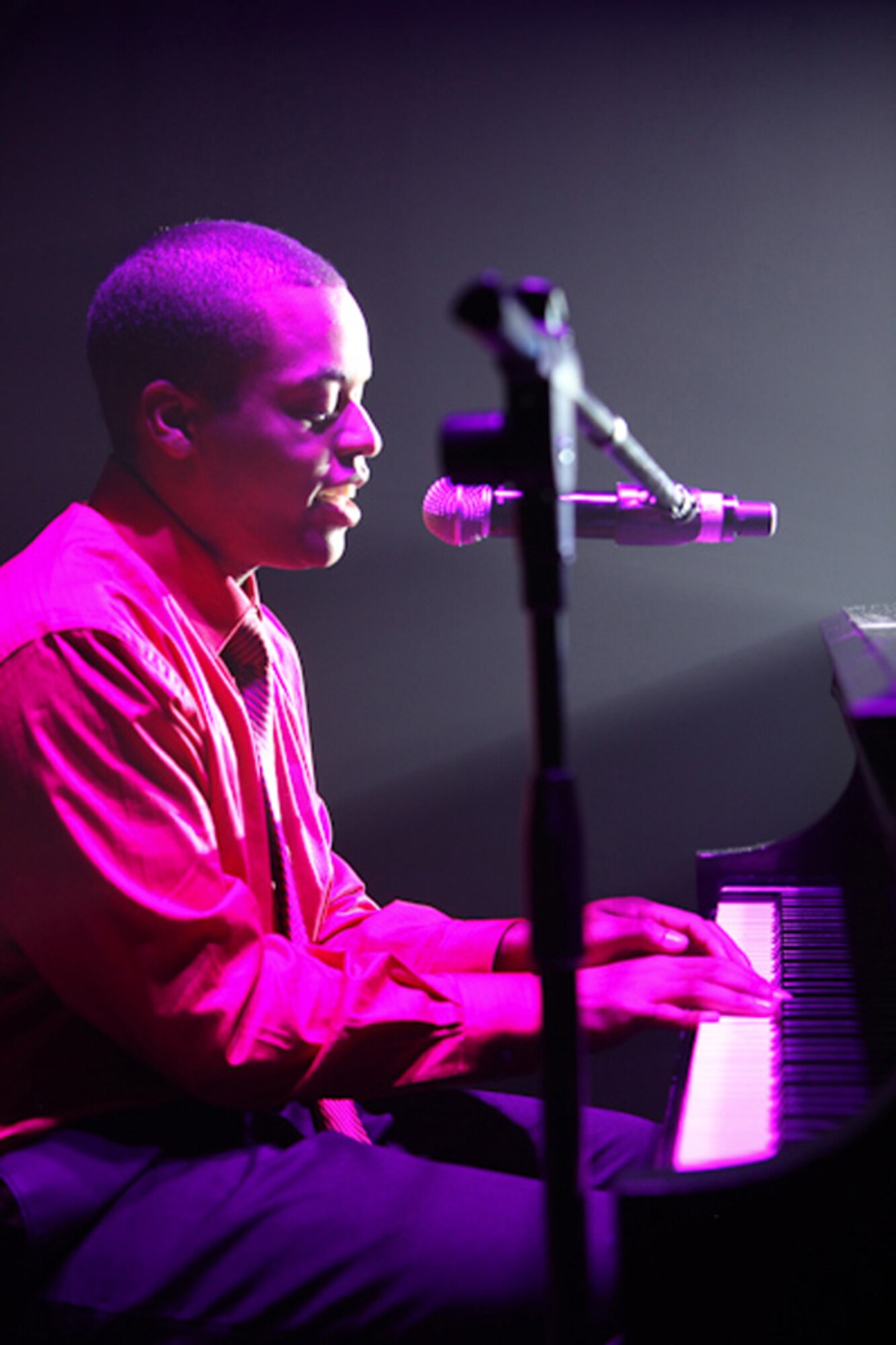 1st Lt. John Early, a 10th Missile Squadron ICBM combat crew commander, performs Bruce Hornsby's "The Way It Is" at the Air Force Worldwide Talent Contest at Lackland Air Force Base, Texas. Of 74 contestests, he was one of 31 selected for the 2010 Tops and Blue team. (Courtesy photo)